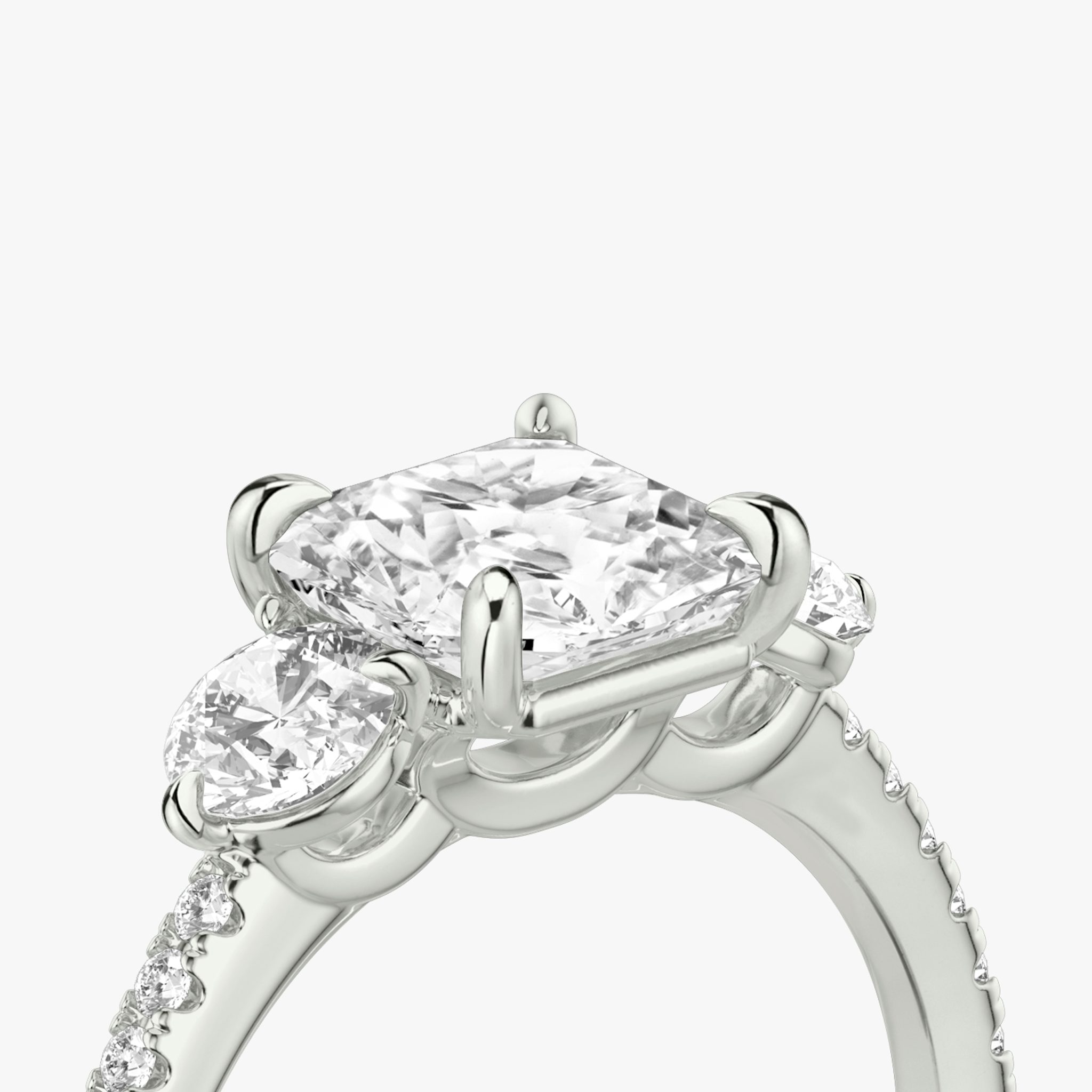 The Three Stone | Asscher | 18k | White Gold | bandAccent: Pavé | sideStoneCarat: 0.25ct | sideStoneShape: Round Brilliant | diamondOrientation: vertical | caratWeight: other
