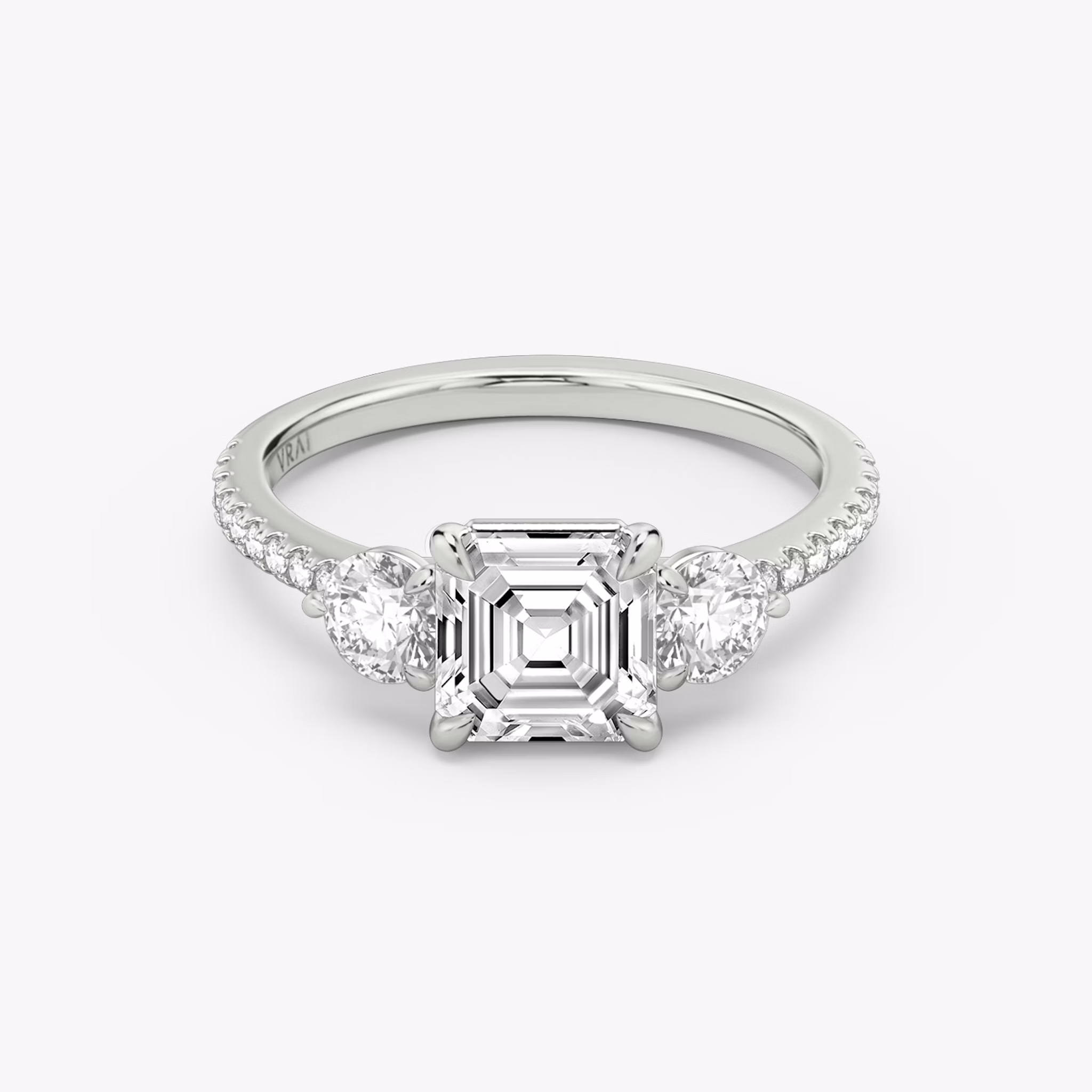 The Three Stone | Asscher | Platinum | bandAccent: Pavé | sideStoneCarat: 0.25ct | sideStoneShape: Round Brilliant | diamondOrientation: vertical | caratWeight: other