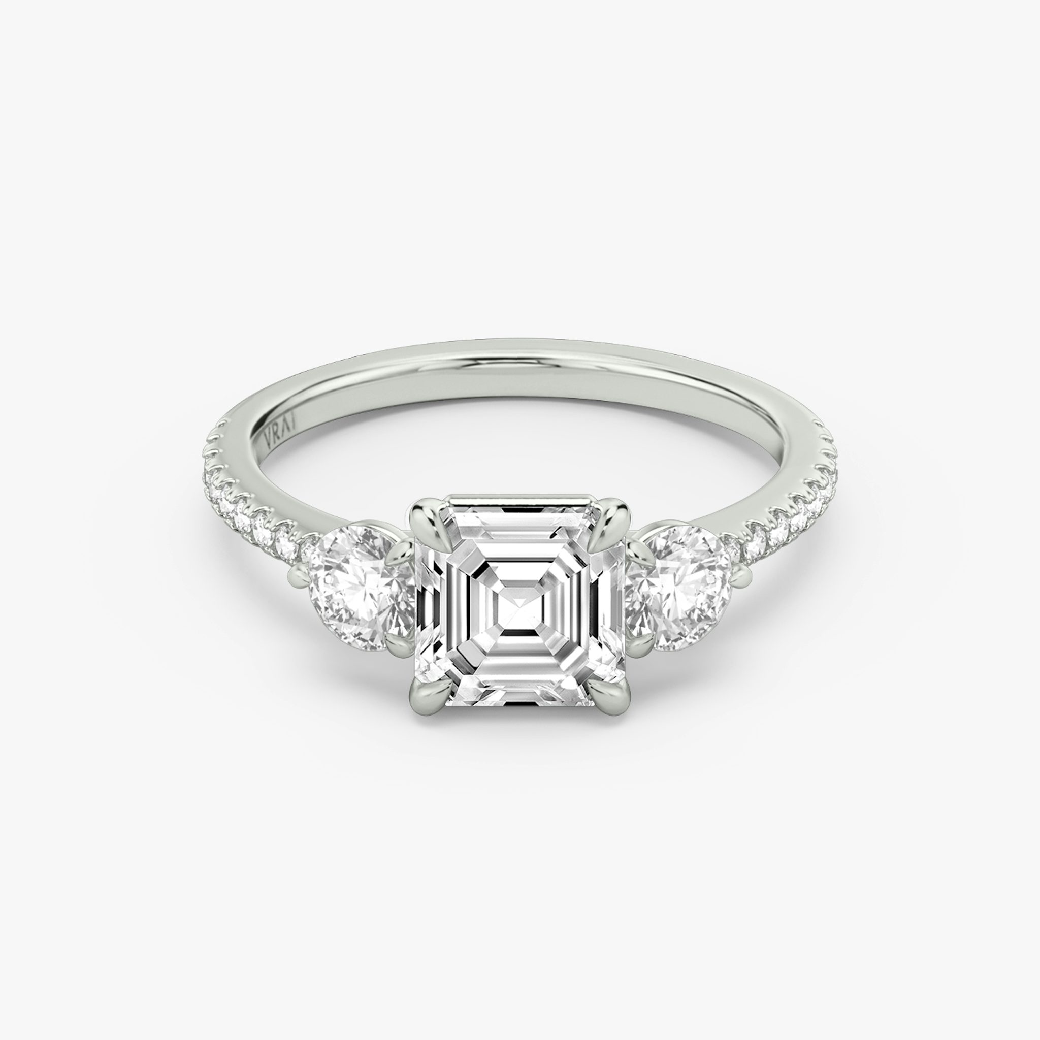 The Three Stone | Asscher | Platinum | bandAccent: Pavé | sideStoneCarat: 0.25ct | sideStoneShape: Round Brilliant | diamondOrientation: vertical | caratWeight: other