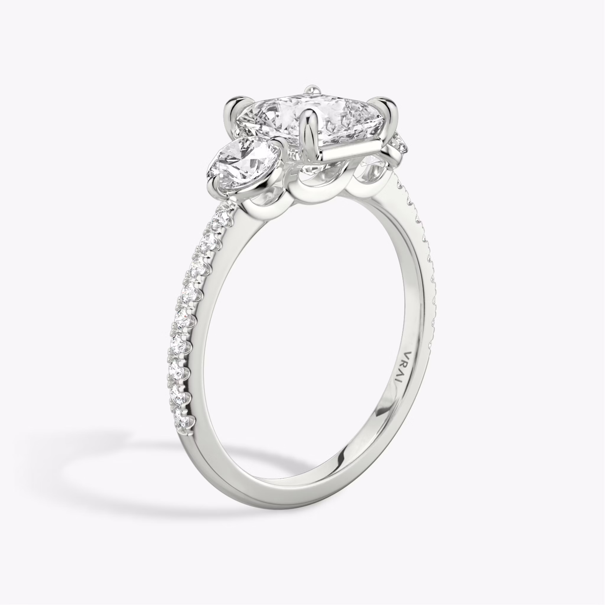 The Three Stone | Asscher | Platinum | bandAccent: Pavé | sideStoneCarat: 0.25ct | sideStoneShape: Round Brilliant | diamondOrientation: vertical | caratWeight: other