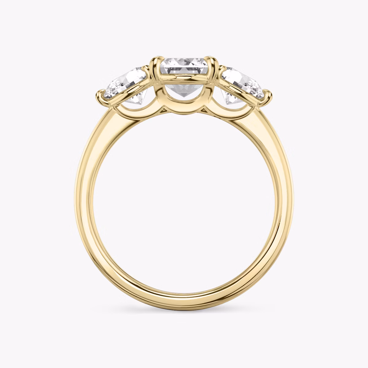 The Three Stone | Emerald | 18k | Yellow Gold | bandAccent: Plain | sideStoneCarat: 0.50ct | sideStoneShape: Round Brilliant | diamondOrientation: vertical | caratWeight: other