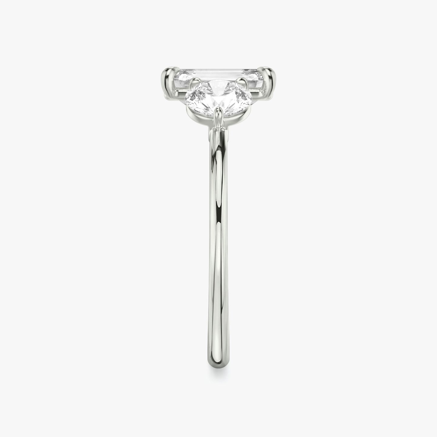 The Three Stone | Emerald | 18k | White Gold | bandAccent: Plain | sideStoneCarat: 0.50ct | sideStoneShape: Round Brilliant | diamondOrientation: vertical | caratWeight: other