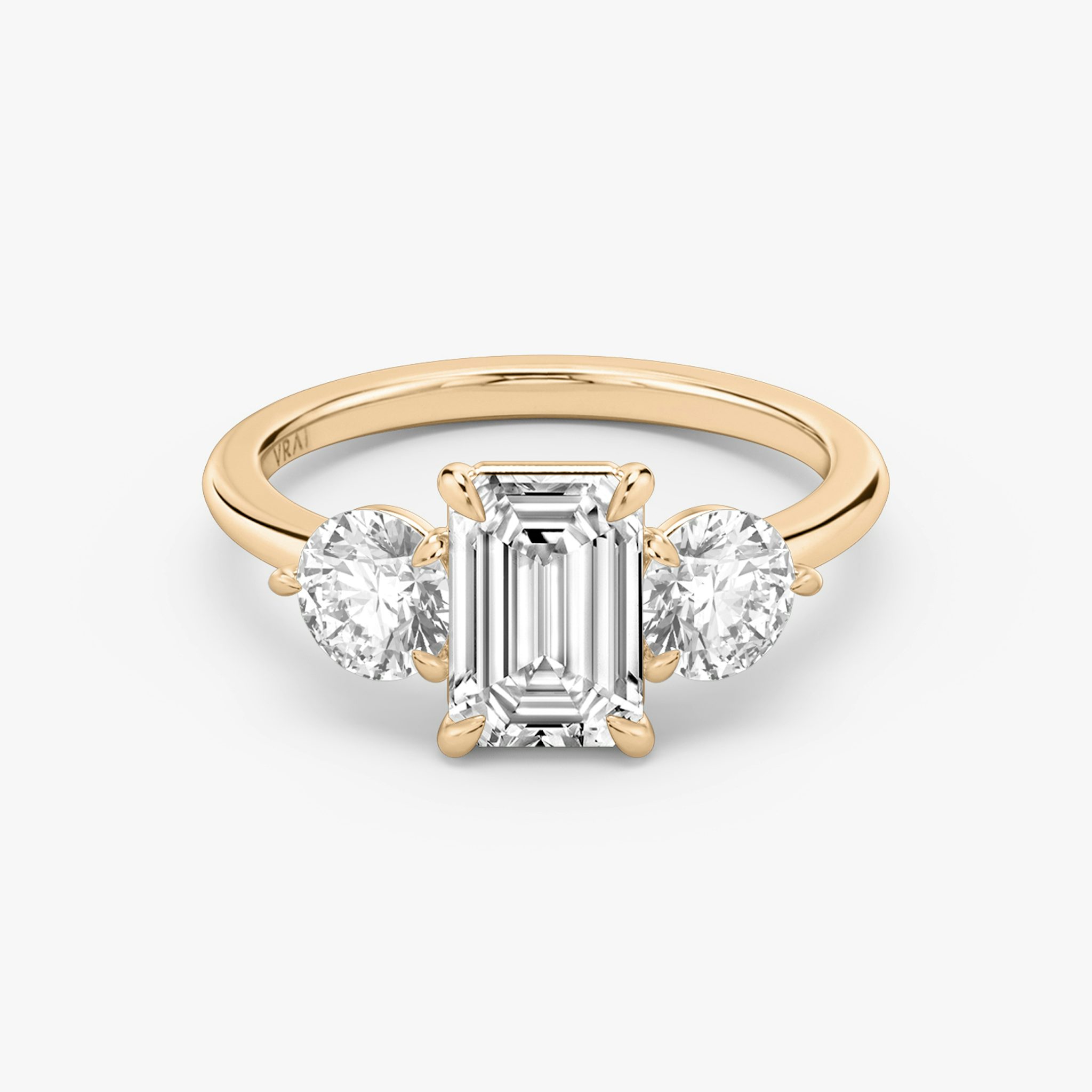 The Three Stone | Emerald | 14k | Rose Gold | bandAccent: Plain | sideStoneCarat: 0.50ct | sideStoneShape: Round Brilliant | diamondOrientation: vertical | caratWeight: other