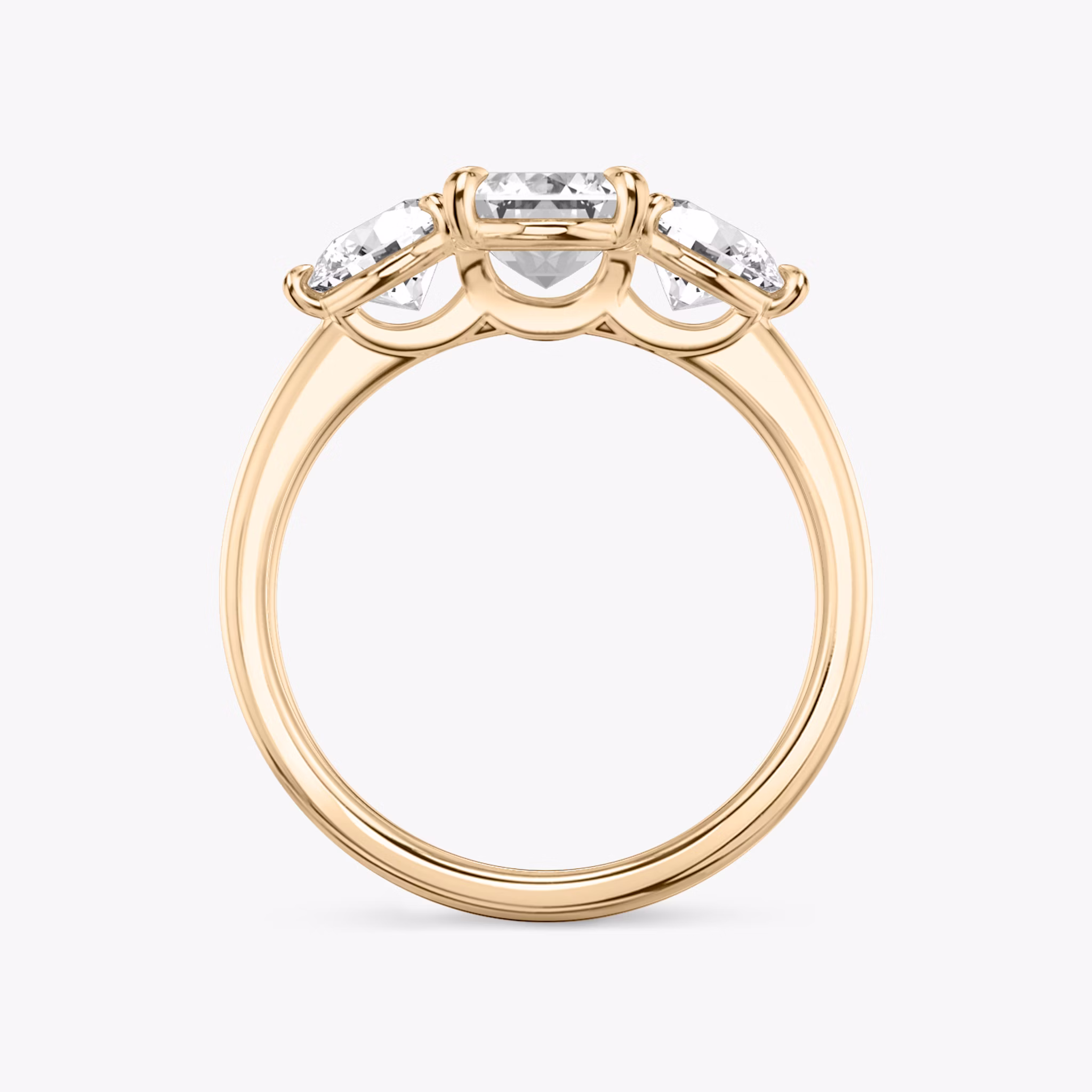 The Three Stone | Emerald | 14k | Rose Gold | bandAccent: Plain | sideStoneCarat: 0.50ct | sideStoneShape: Round Brilliant | diamondOrientation: vertical | caratWeight: other