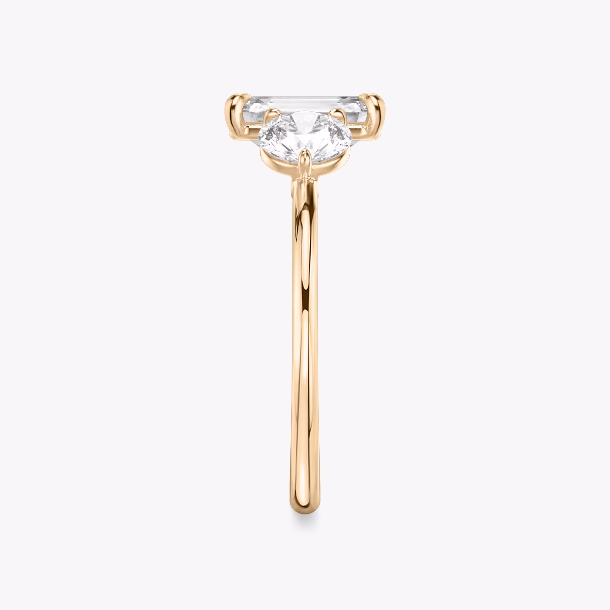 The Three Stone | Emerald | 14k | Rose Gold | bandAccent: Plain | sideStoneCarat: 0.50ct | sideStoneShape: Round Brilliant | diamondOrientation: vertical | caratWeight: other