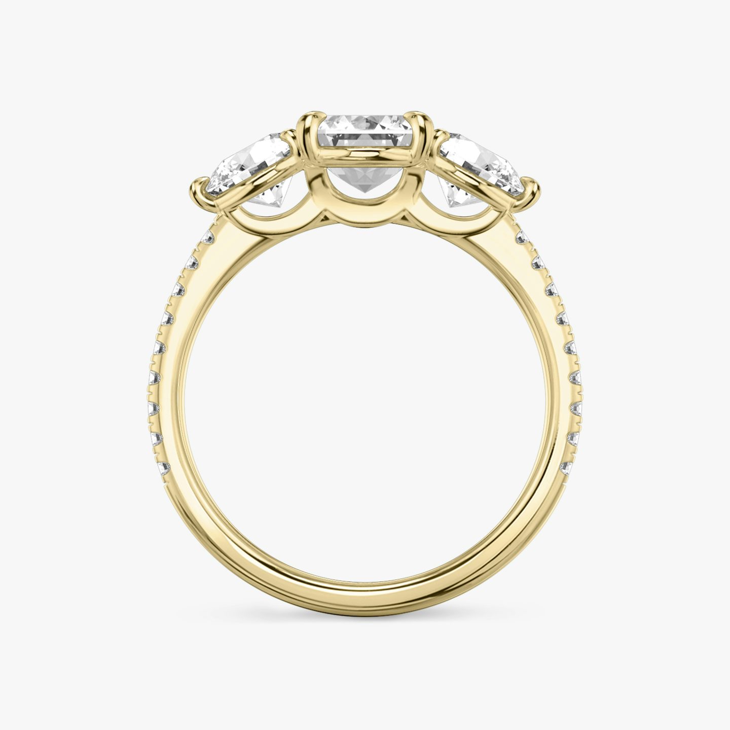 The Three Stone | Emerald | 18k | Yellow Gold | bandAccent: Pavé | sideStoneCarat: 0.50ct | sideStoneShape: Round Brilliant | diamondOrientation: vertical | caratWeight: other