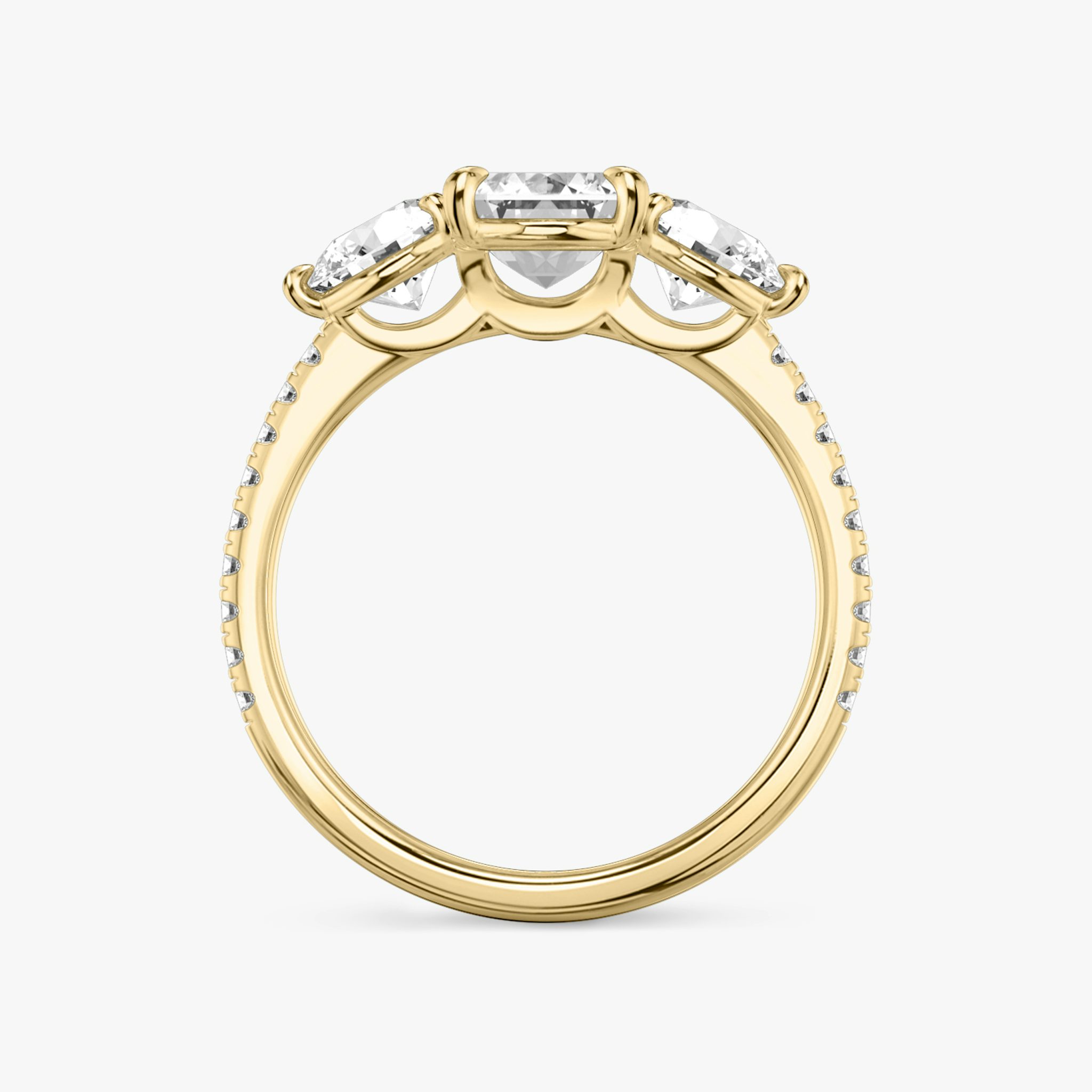 The Three Stone | Emerald | 18k | Yellow Gold | bandAccent: Pavé | sideStoneCarat: 0.50ct | sideStoneShape: Round Brilliant | diamondOrientation: vertical | caratWeight: other