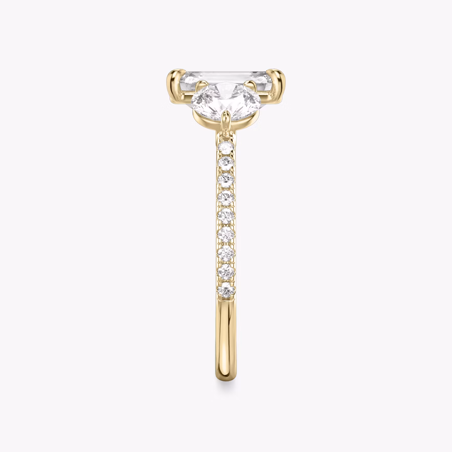 The Three Stone | Emerald | 18k | Yellow Gold | bandAccent: Pavé | sideStoneCarat: 0.50ct | sideStoneShape: Round Brilliant | diamondOrientation: vertical | caratWeight: other
