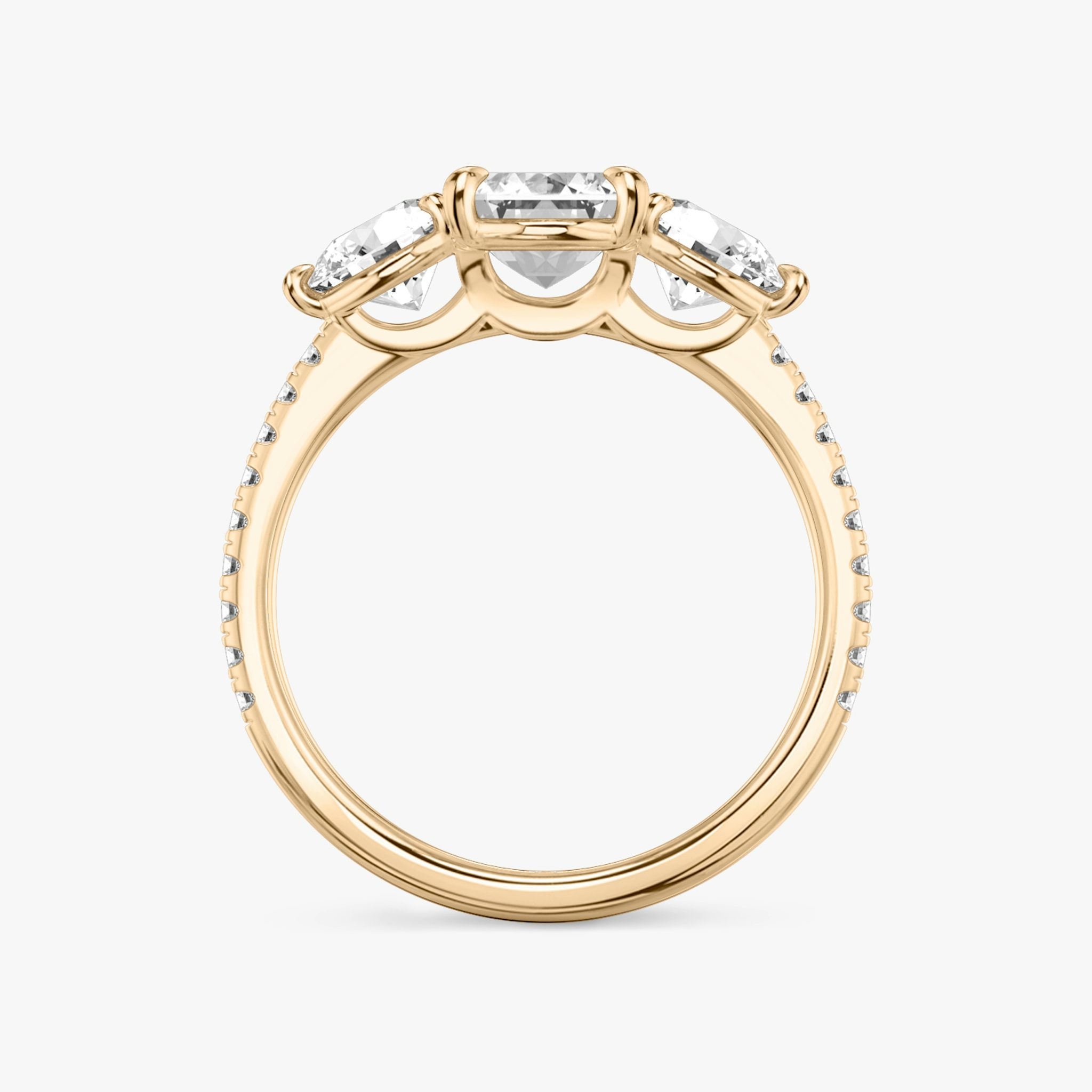 The Three Stone | Emerald | 14k | Rose Gold | bandAccent: Pavé | sideStoneCarat: 0.50ct | sideStoneShape: Round Brilliant | diamondOrientation: vertical | caratWeight: other
