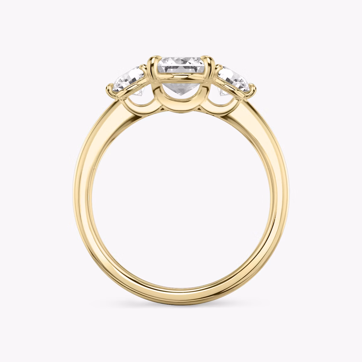 The Three Stone | Emerald | 18k | Yellow Gold | bandAccent: Plain | sideStoneCarat: 0.25ct | sideStoneShape: Round Brilliant | diamondOrientation: vertical | caratWeight: other
