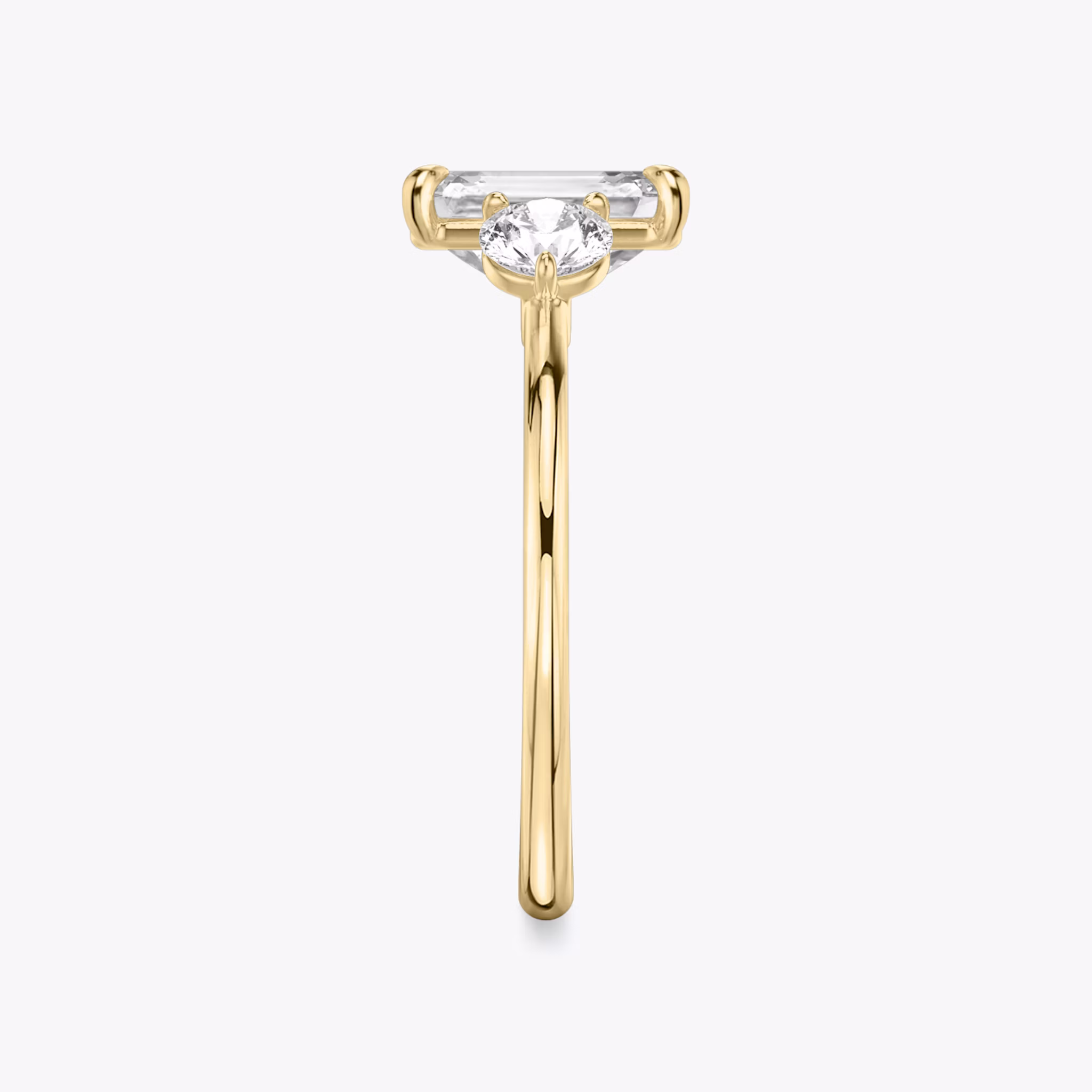 The Three Stone | Emerald | 18k | Yellow Gold | bandAccent: Plain | sideStoneCarat: 0.25ct | sideStoneShape: Round Brilliant | diamondOrientation: vertical | caratWeight: other