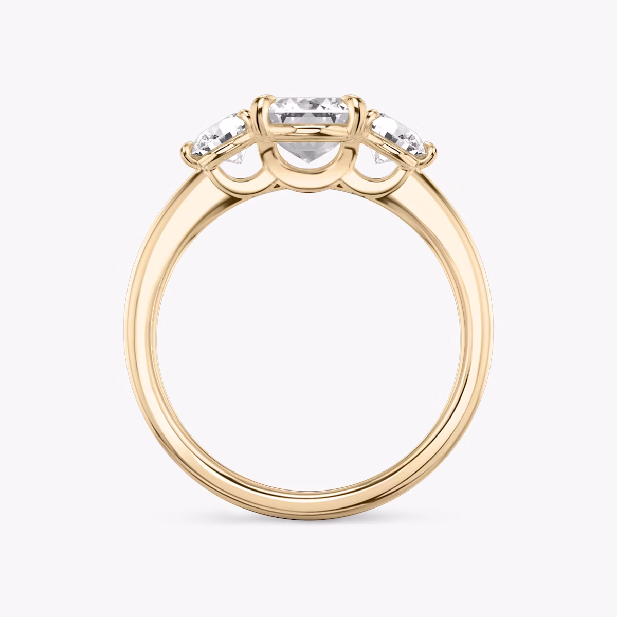 The Three Stone | Emerald | 14k | Rose Gold | bandAccent: Plain | sideStoneCarat: 0.25ct | sideStoneShape: Round Brilliant | diamondOrientation: vertical | caratWeight: other