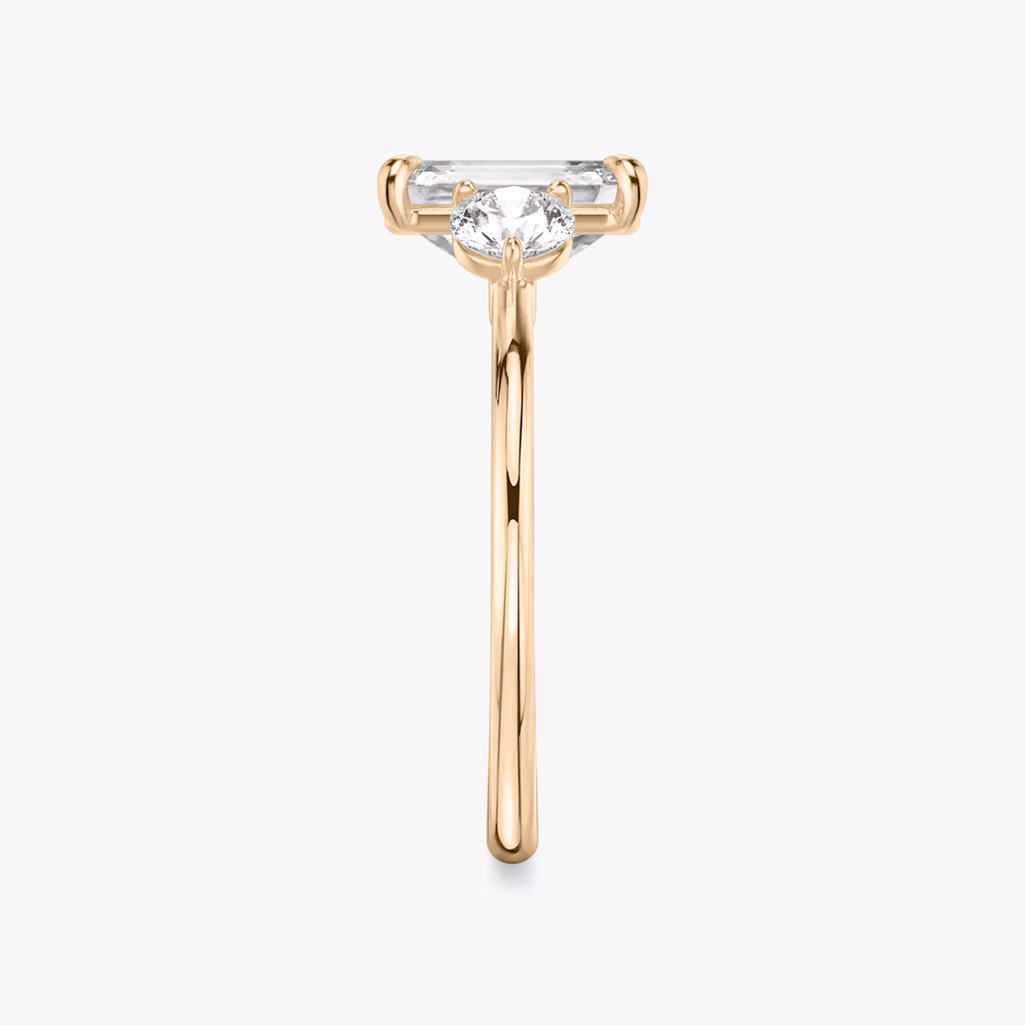 The Three Stone | Emerald | 14k | Rose Gold | bandAccent: Plain | sideStoneCarat: 0.25ct | sideStoneShape: Round Brilliant | diamondOrientation: vertical | caratWeight: other