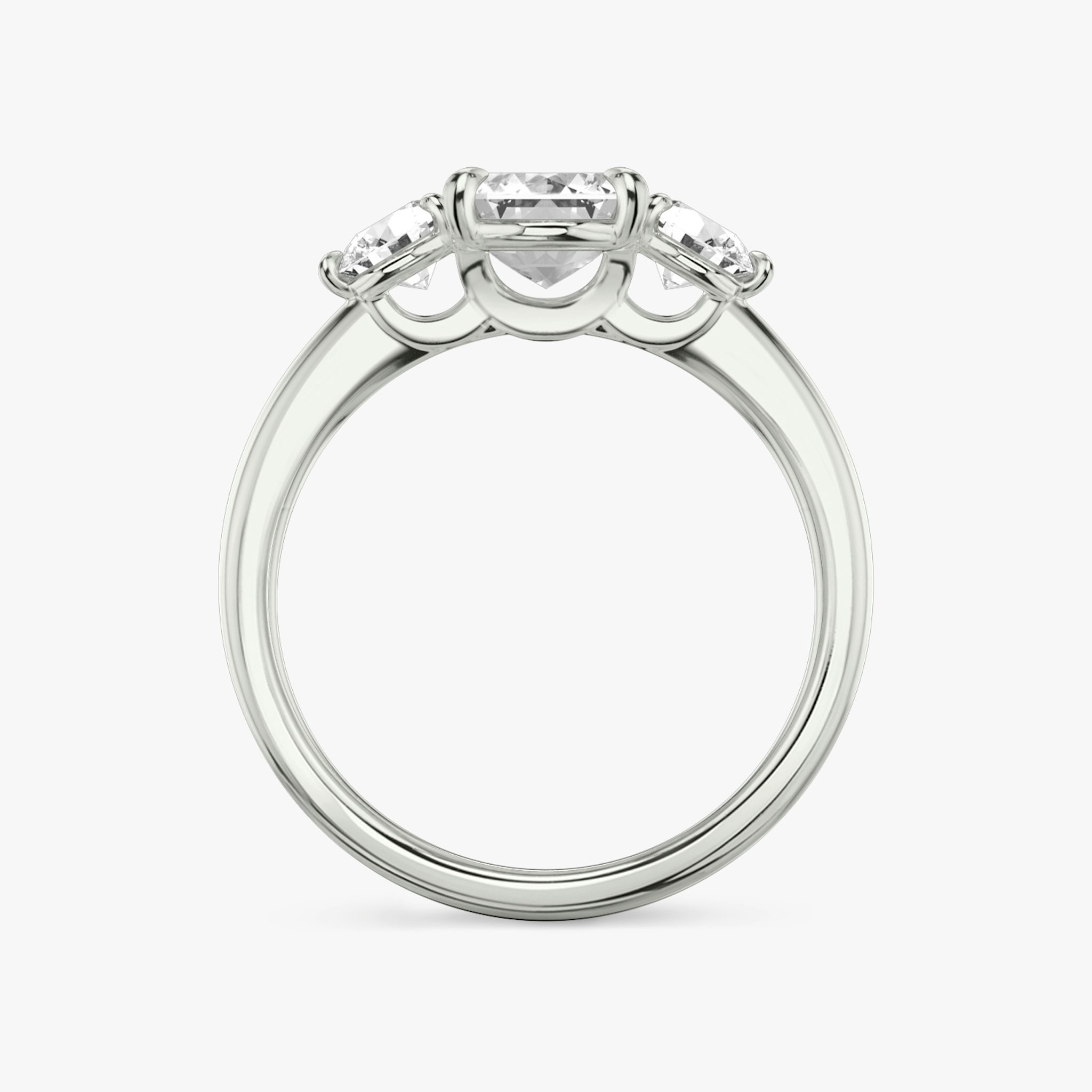 The Three Stone | Emerald | Platinum | bandAccent: Plain | sideStoneCarat: 0.25ct | sideStoneShape: Round Brilliant | diamondOrientation: vertical | caratWeight: other