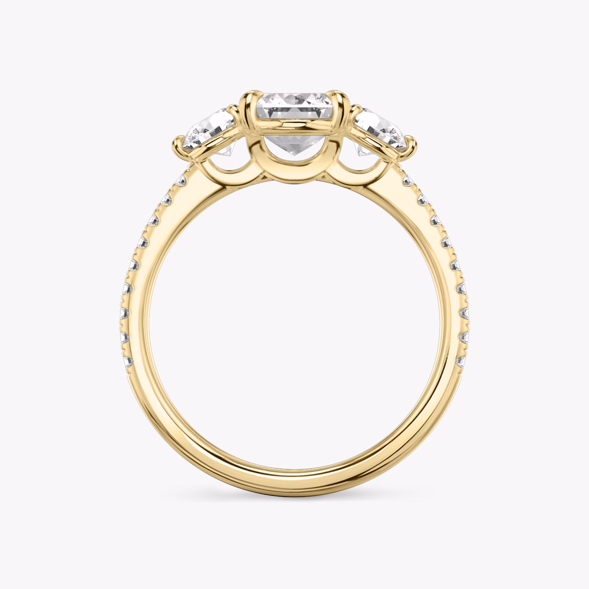 The Three Stone | Emerald | 18k | Yellow Gold | bandAccent: Pavé | sideStoneCarat: 0.25ct | sideStoneShape: Round Brilliant | diamondOrientation: vertical | caratWeight: other