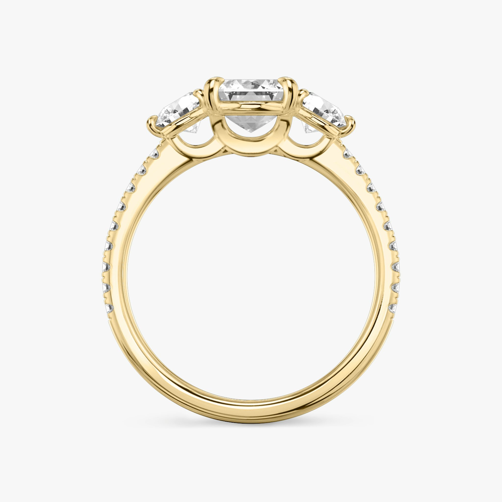 The Three Stone | Emerald | 18k | Yellow Gold | bandAccent: Pavé | sideStoneCarat: 0.25ct | sideStoneShape: Round Brilliant | diamondOrientation: vertical | caratWeight: other