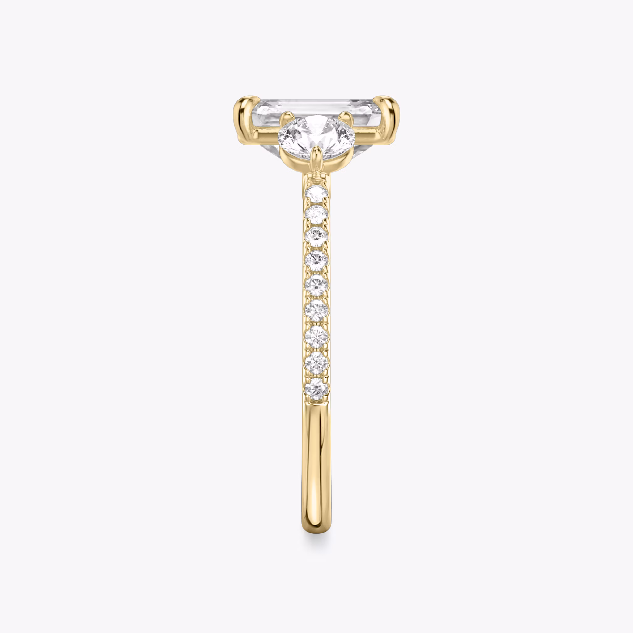 The Three Stone | Emerald | 18k | Yellow Gold | bandAccent: Pavé | sideStoneCarat: 0.25ct | sideStoneShape: Round Brilliant | diamondOrientation: vertical | caratWeight: other