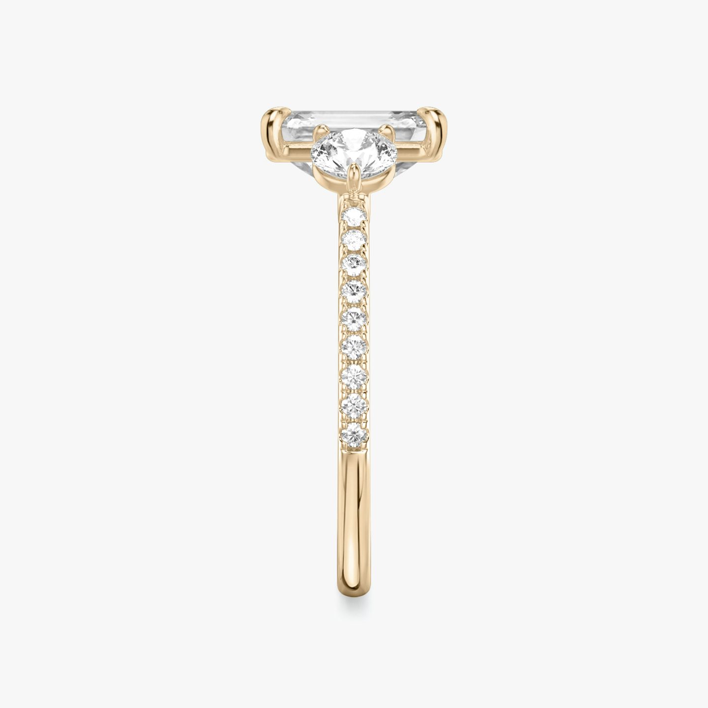 The Three Stone | Emerald | 14k | Rose Gold | bandAccent: Pavé | sideStoneCarat: 0.25ct | sideStoneShape: Round Brilliant | diamondOrientation: vertical | caratWeight: other