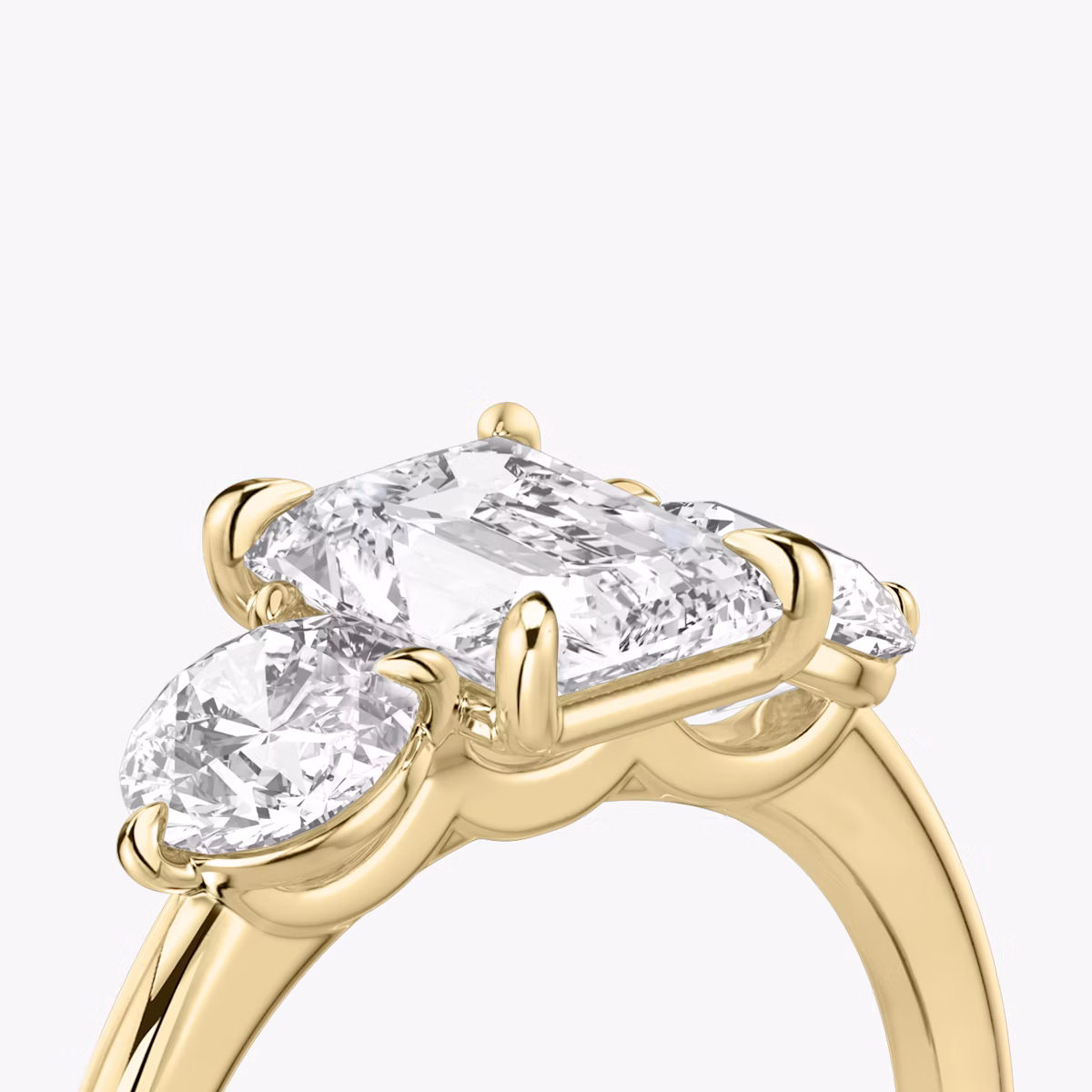 The Three Stone | Radiant | 18k | Yellow Gold | bandAccent: Plain | sideStoneCarat: 0.50ct | sideStoneShape: Round Brilliant | diamondOrientation: vertical | caratWeight: other