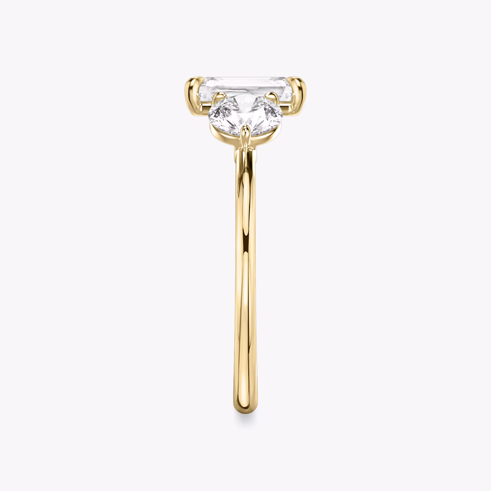 The Three Stone | Radiant | 18k | Yellow Gold | bandAccent: Plain | sideStoneCarat: 0.50ct | sideStoneShape: Round Brilliant | diamondOrientation: vertical | caratWeight: other