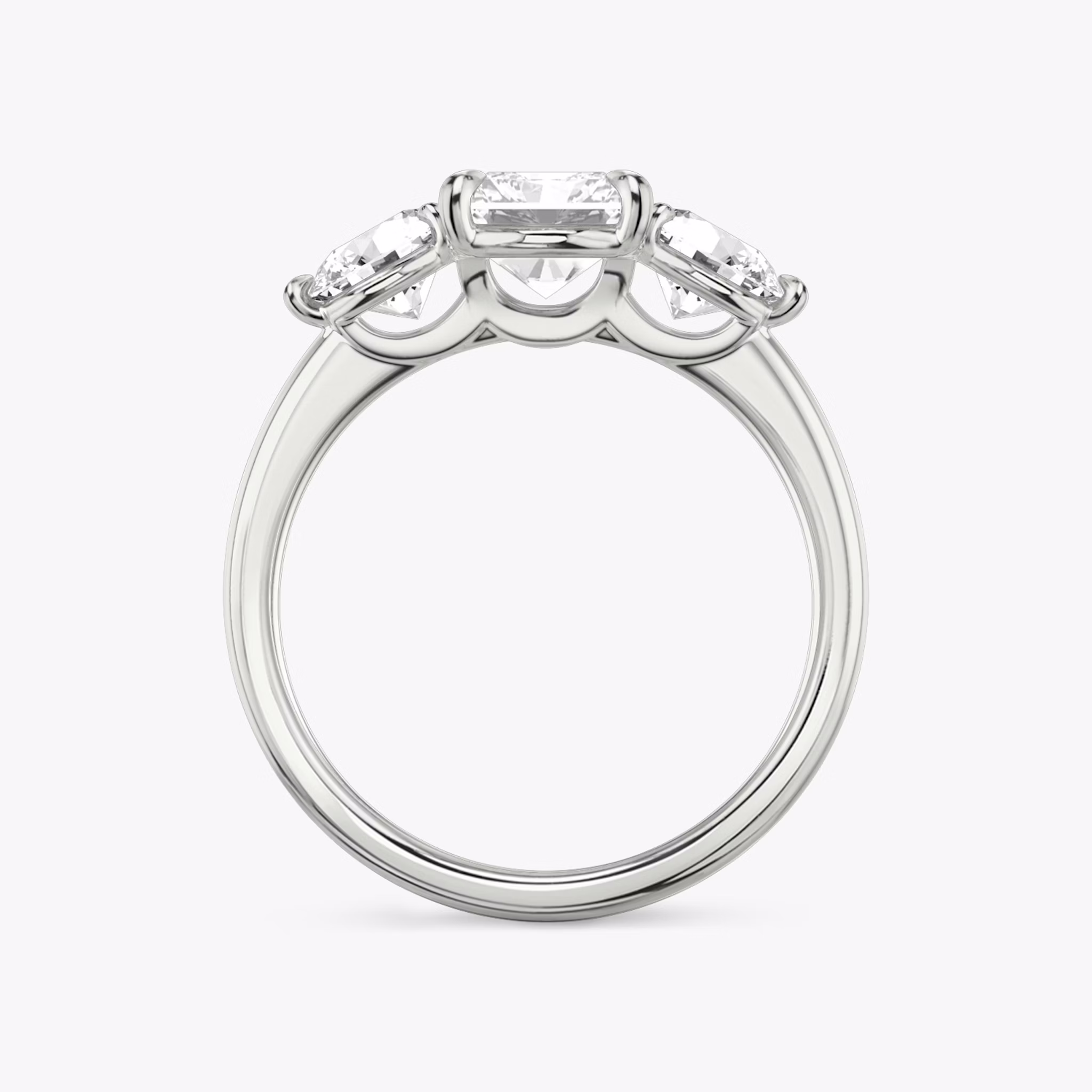 The Three Stone | Radiant | 18k | White Gold | bandAccent: Plain | sideStoneCarat: 0.50ct | sideStoneShape: Round Brilliant | diamondOrientation: vertical | caratWeight: other