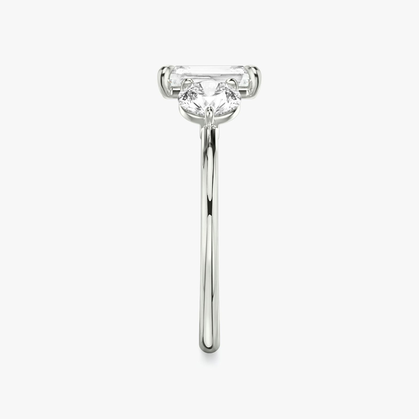 The Three Stone | Radiant | Platinum | bandAccent: Plain | sideStoneCarat: 0.50ct | sideStoneShape: Round Brilliant | diamondOrientation: vertical | caratWeight: other