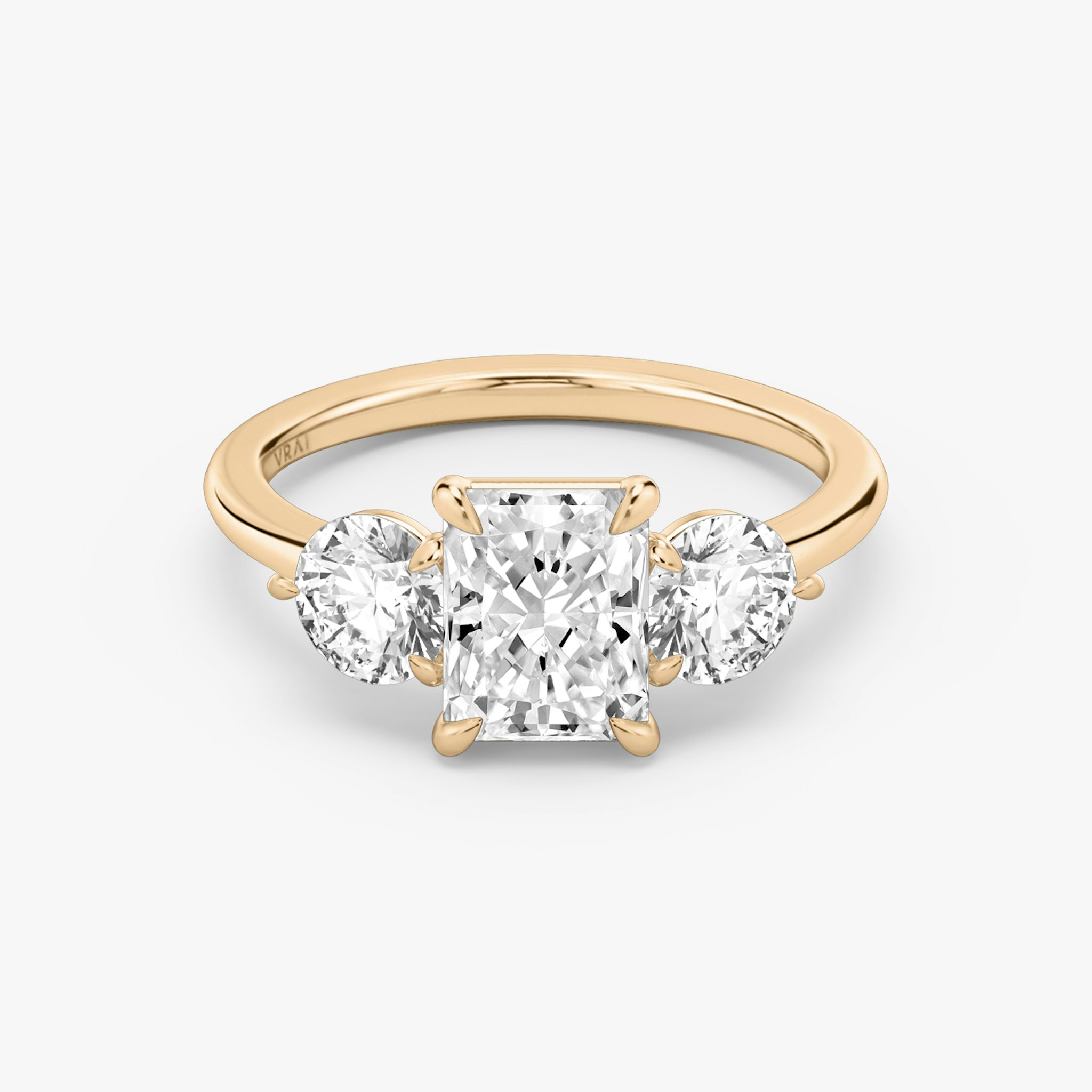 The Three Stone | Radiant | 14k | Rose Gold | bandAccent: Plain | sideStoneCarat: 0.50ct | sideStoneShape: Round Brilliant | diamondOrientation: vertical | caratWeight: other