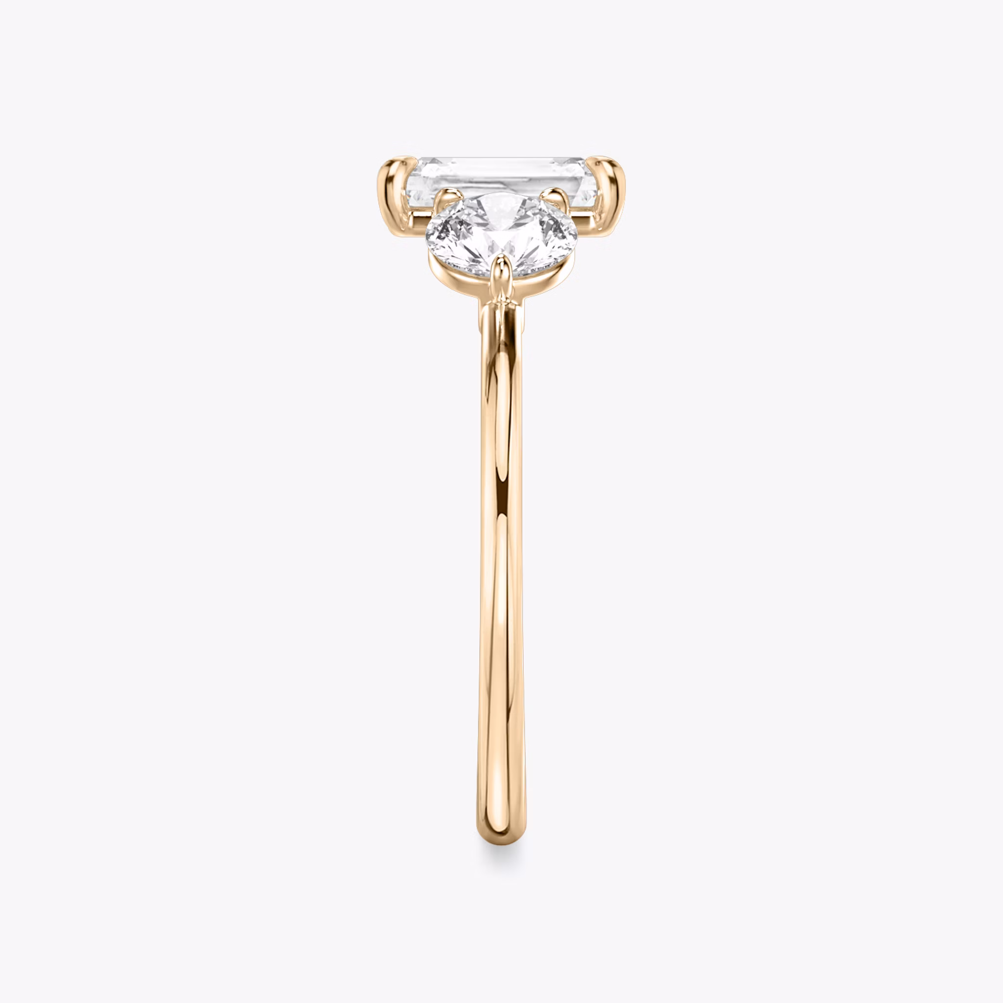 The Three Stone | Radiant | 14k | Rose Gold | bandAccent: Plain | sideStoneCarat: 0.50ct | sideStoneShape: Round Brilliant | diamondOrientation: vertical | caratWeight: other