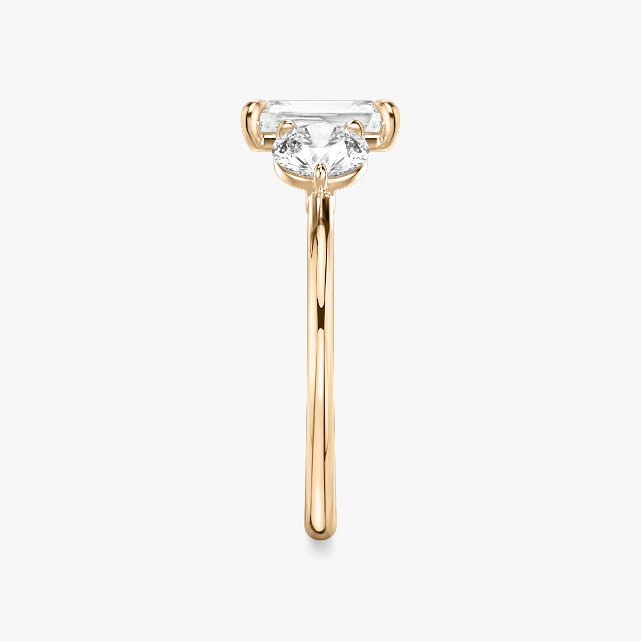 The Three Stone | Radiant | 14k | Rose Gold | bandAccent: Plain | sideStoneCarat: 0.50ct | sideStoneShape: Round Brilliant | diamondOrientation: vertical | caratWeight: other