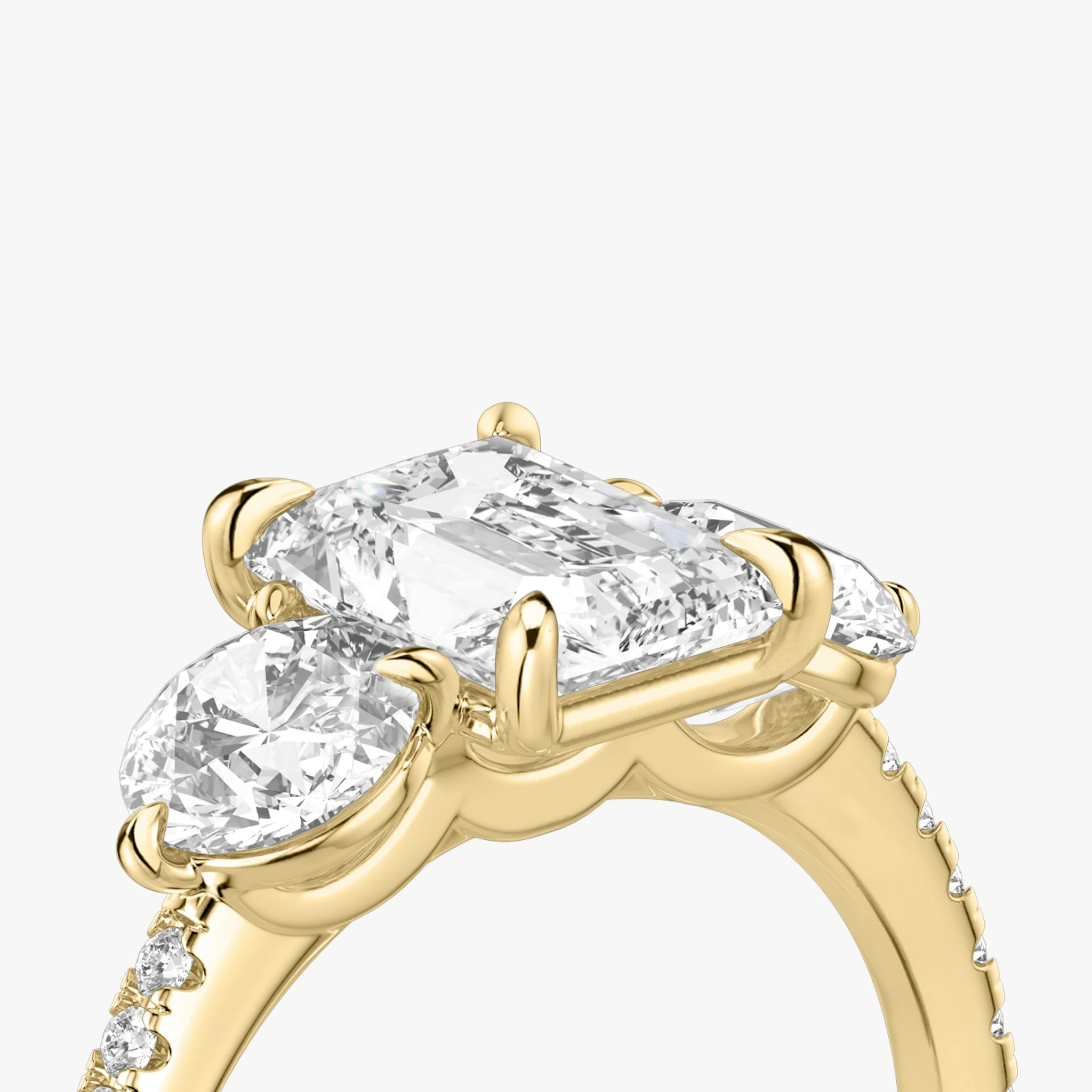 The Three Stone | Radiant | 18k | Yellow Gold | bandAccent: Pavé | sideStoneCarat: 0.50ct | sideStoneShape: Round Brilliant | diamondOrientation: vertical | caratWeight: other