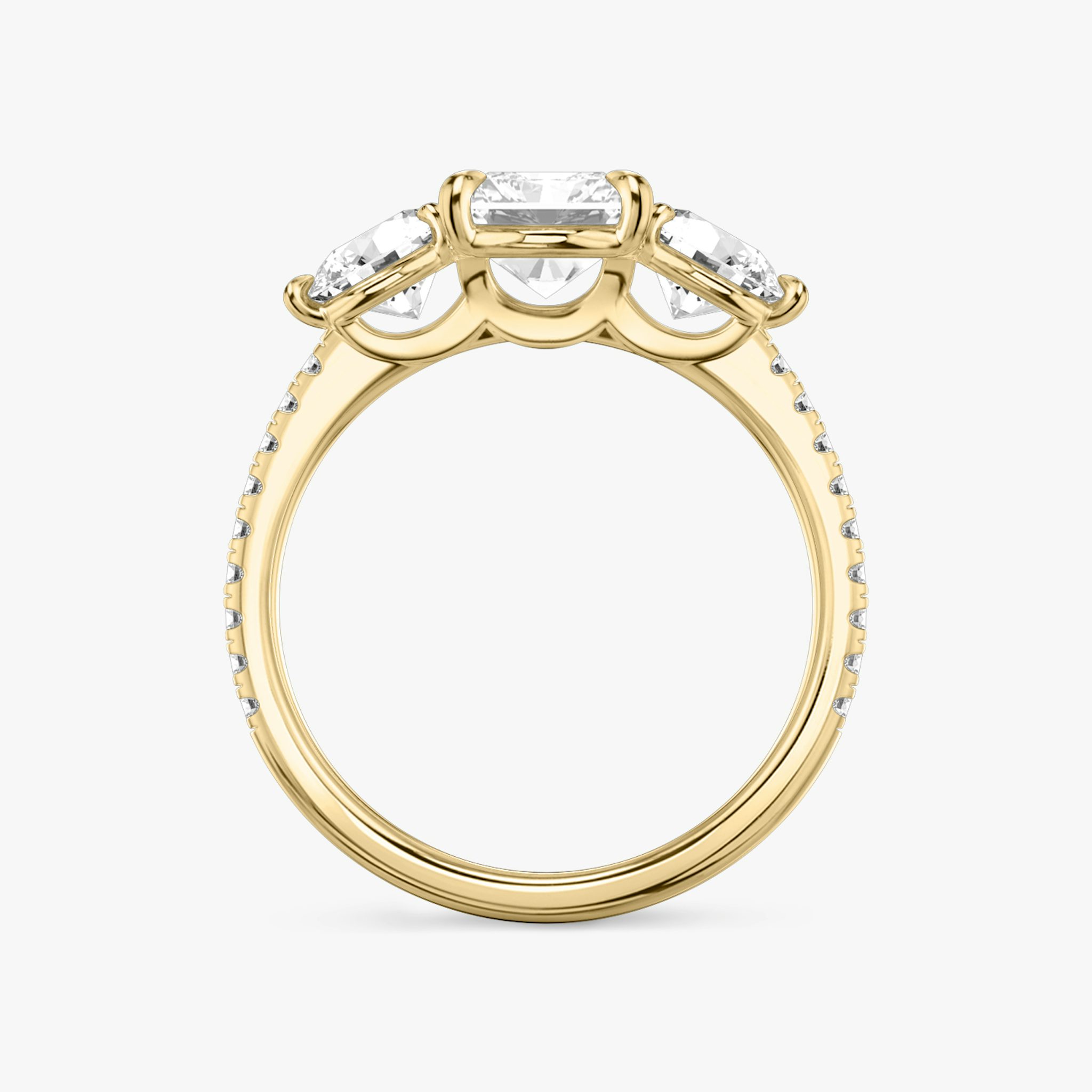 The Three Stone | Radiant | 18k | Yellow Gold | bandAccent: Pavé | sideStoneCarat: 0.50ct | sideStoneShape: Round Brilliant | diamondOrientation: vertical | caratWeight: other