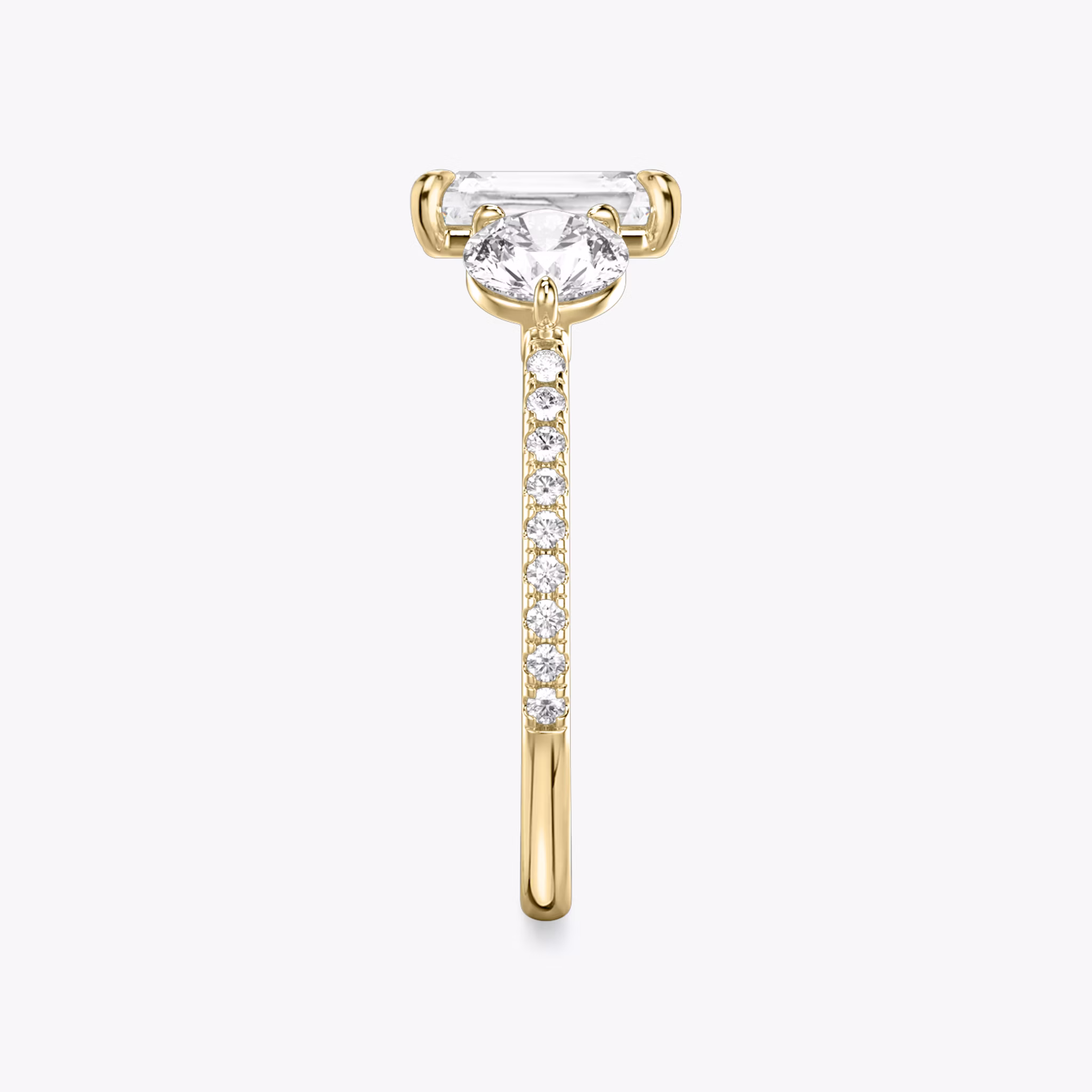 The Three Stone | Radiant | 18k | Yellow Gold | bandAccent: Pavé | sideStoneCarat: 0.50ct | sideStoneShape: Round Brilliant | diamondOrientation: vertical | caratWeight: other