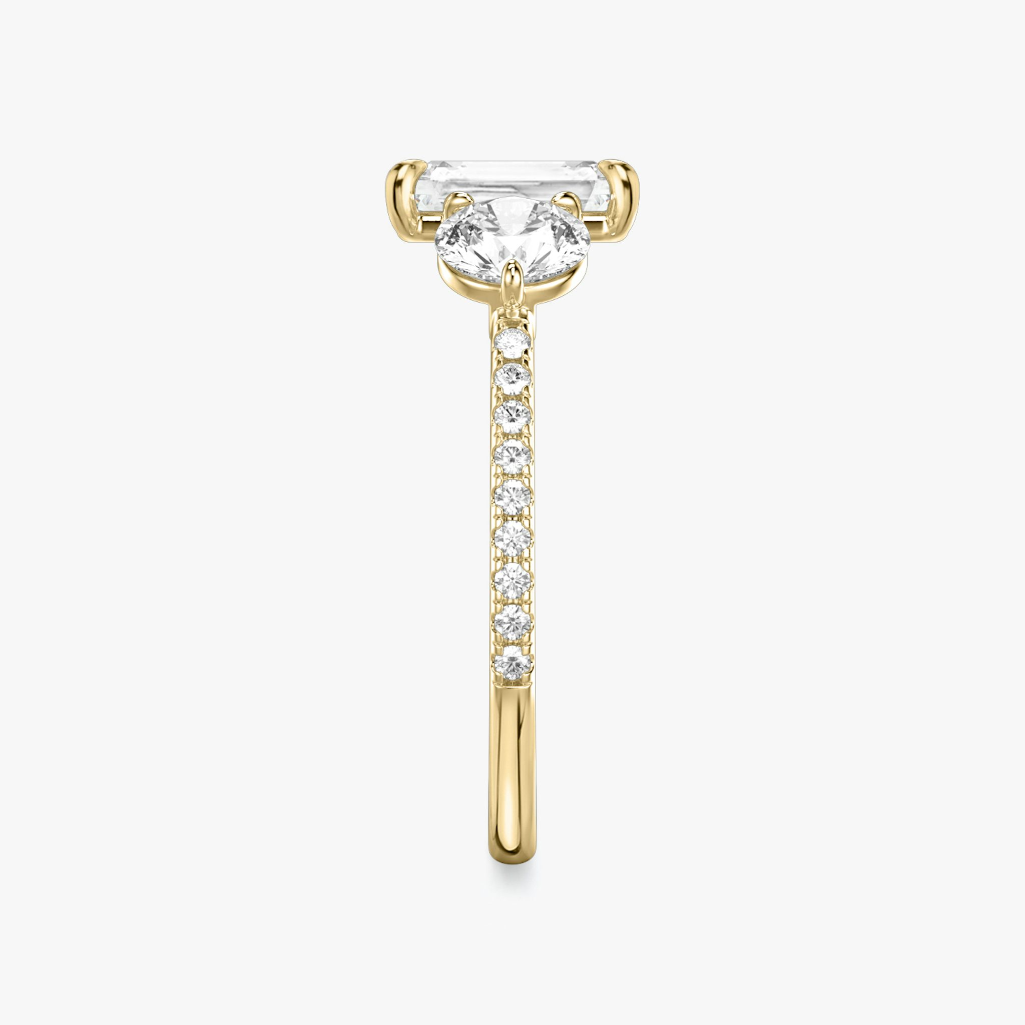 The Three Stone | Radiant | 18k | Yellow Gold | bandAccent: Pavé | sideStoneCarat: 0.50ct | sideStoneShape: Round Brilliant | diamondOrientation: vertical | caratWeight: other