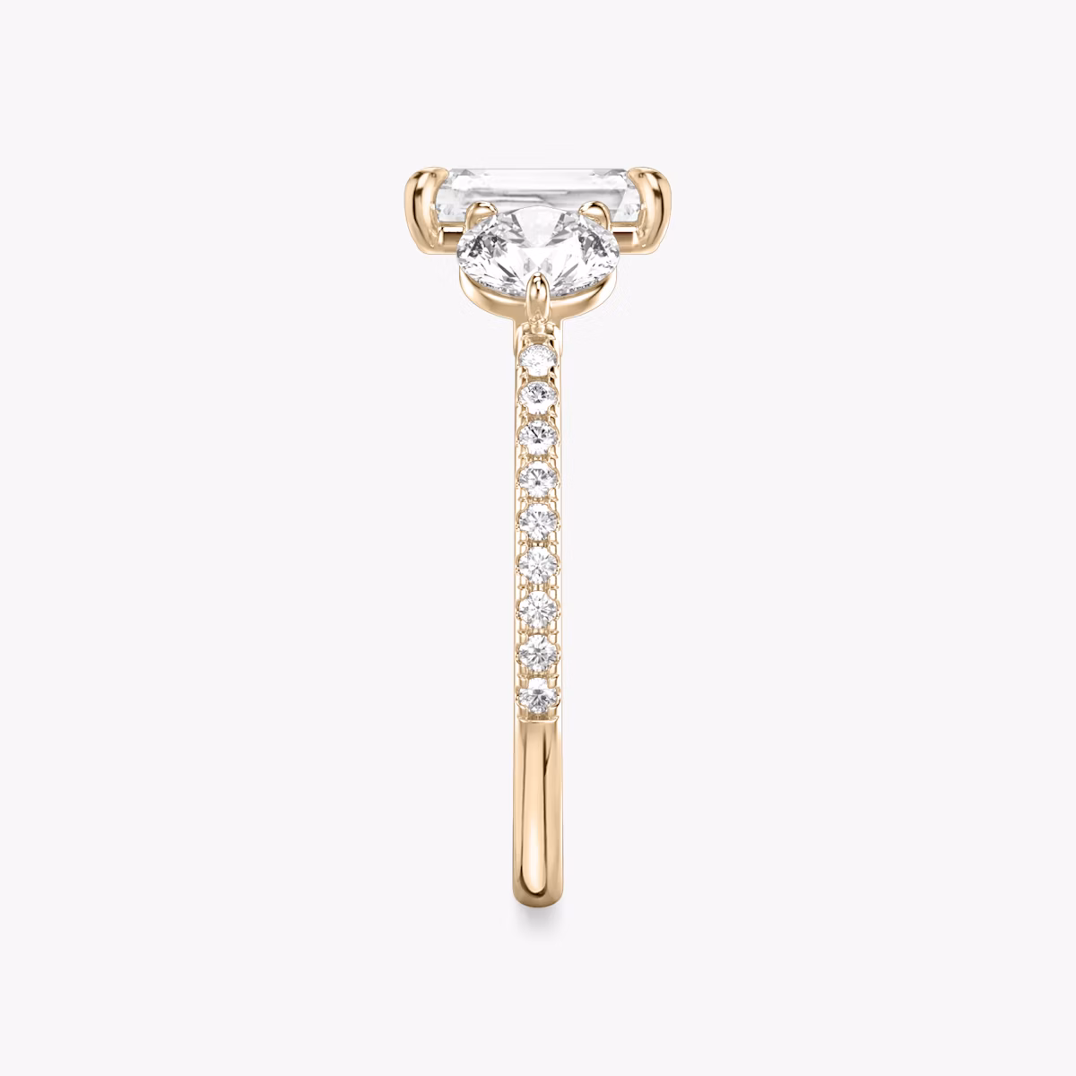 The Three Stone | Radiant | 14k | Rose Gold | bandAccent: Pavé | sideStoneCarat: 0.50ct | sideStoneShape: Round Brilliant | diamondOrientation: vertical | caratWeight: other