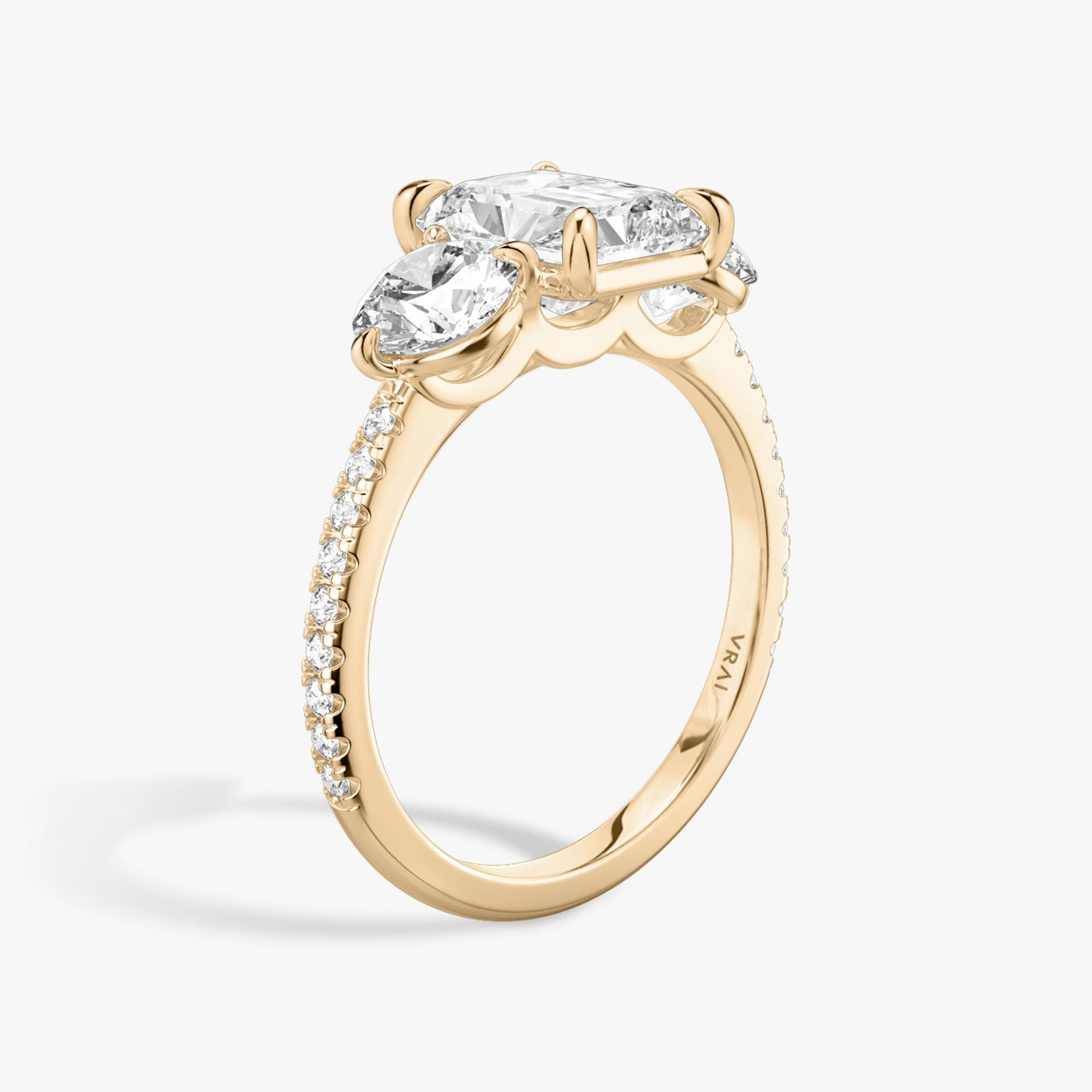 The Three Stone | Radiant | 14k | Rose Gold | bandAccent: Pavé | sideStoneCarat: 0.50ct | sideStoneShape: Round Brilliant | diamondOrientation: vertical | caratWeight: other