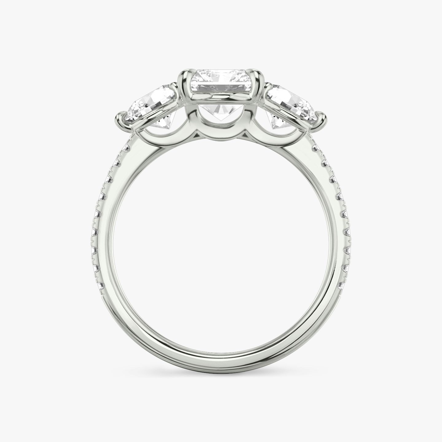 The Three Stone | Radiant | Platinum | bandAccent: Pavé | sideStoneCarat: 0.50ct | sideStoneShape: Round Brilliant | diamondOrientation: vertical | caratWeight: other