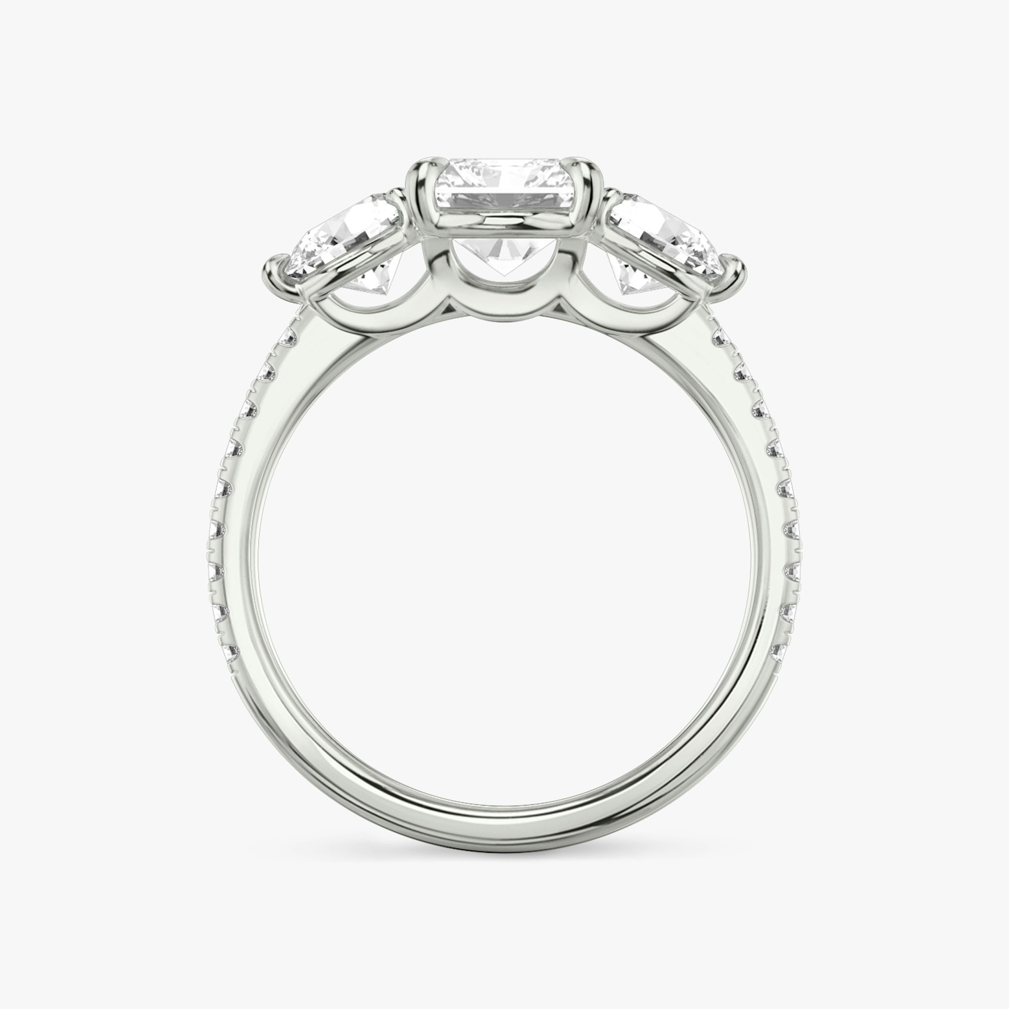 The Three Stone | Radiant | Platinum | bandAccent: Pavé | sideStoneCarat: 0.50ct | sideStoneShape: Round Brilliant | diamondOrientation: vertical | caratWeight: other