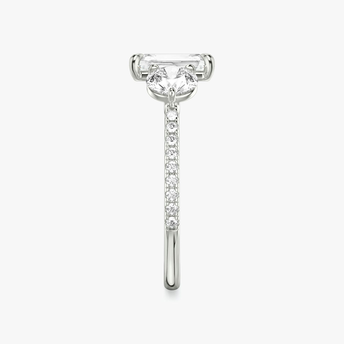 The Three Stone | Radiant | Platinum | bandAccent: Pavé | sideStoneCarat: 0.50ct | sideStoneShape: Round Brilliant | diamondOrientation: vertical | caratWeight: other