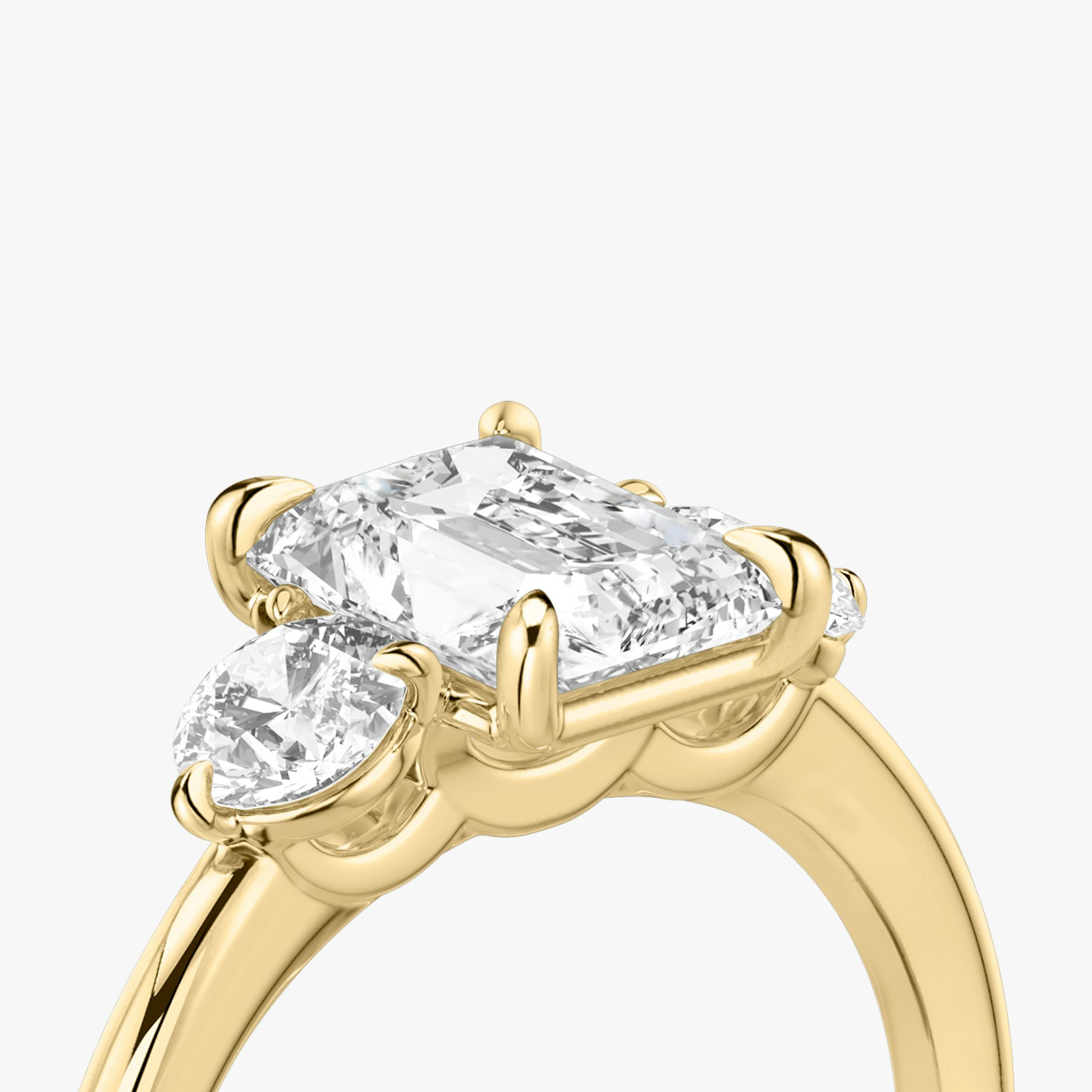 The Three Stone | Radiant | 18k | Yellow Gold | bandAccent: Plain | sideStoneCarat: 0.25ct | sideStoneShape: Round Brilliant | diamondOrientation: vertical | caratWeight: other