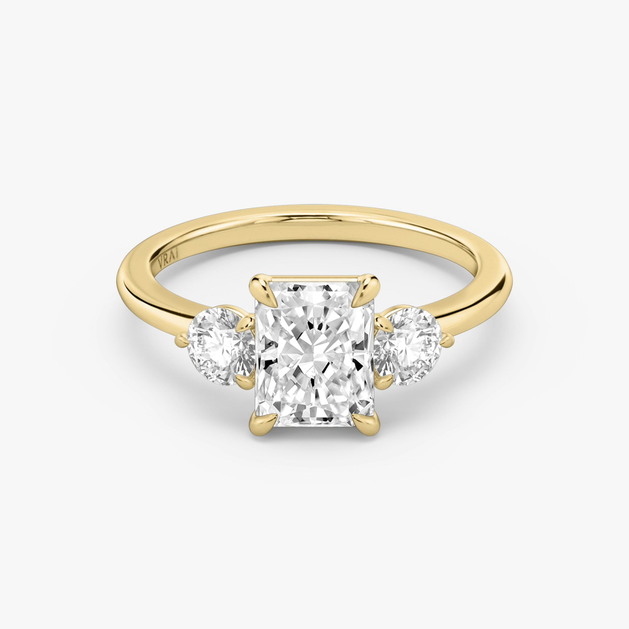 The Three Stone | Radiant | 18k | Yellow Gold | bandAccent: Plain | sideStoneCarat: 0.25ct | sideStoneShape: Round Brilliant | diamondOrientation: vertical | caratWeight: other