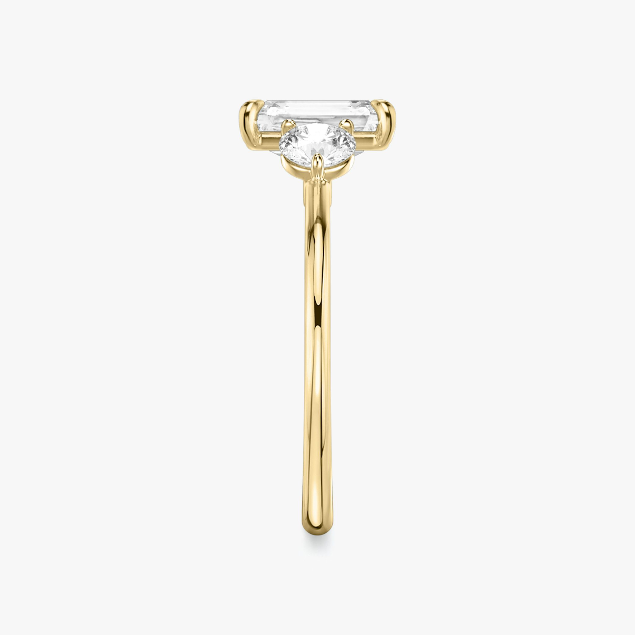 The Three Stone | Radiant | 18k | Yellow Gold | bandAccent: Plain | sideStoneCarat: 0.25ct | sideStoneShape: Round Brilliant | diamondOrientation: vertical | caratWeight: other