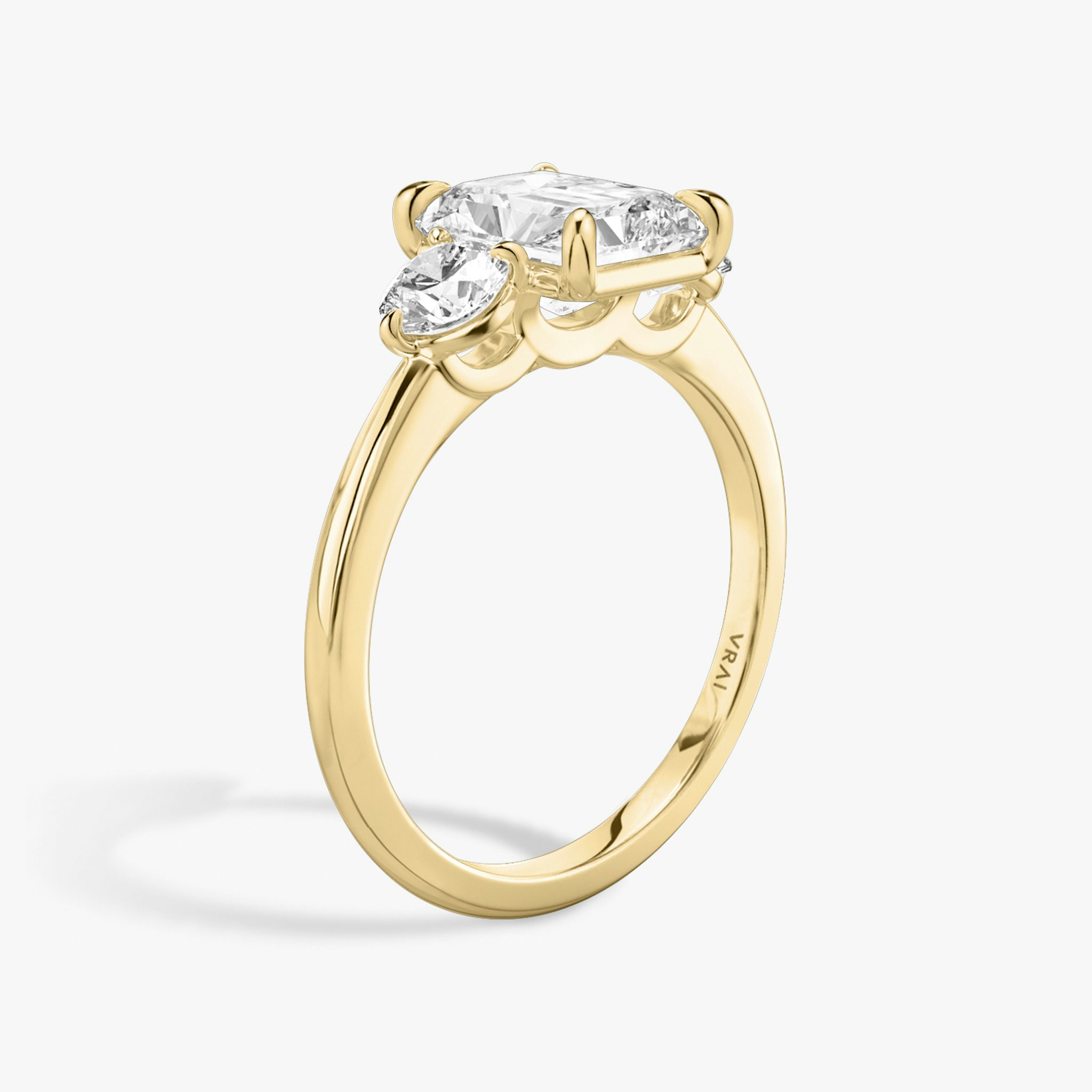 The Three Stone | Radiant | 18k | Yellow Gold | bandAccent: Plain | sideStoneCarat: 0.25ct | sideStoneShape: Round Brilliant | diamondOrientation: vertical | caratWeight: other