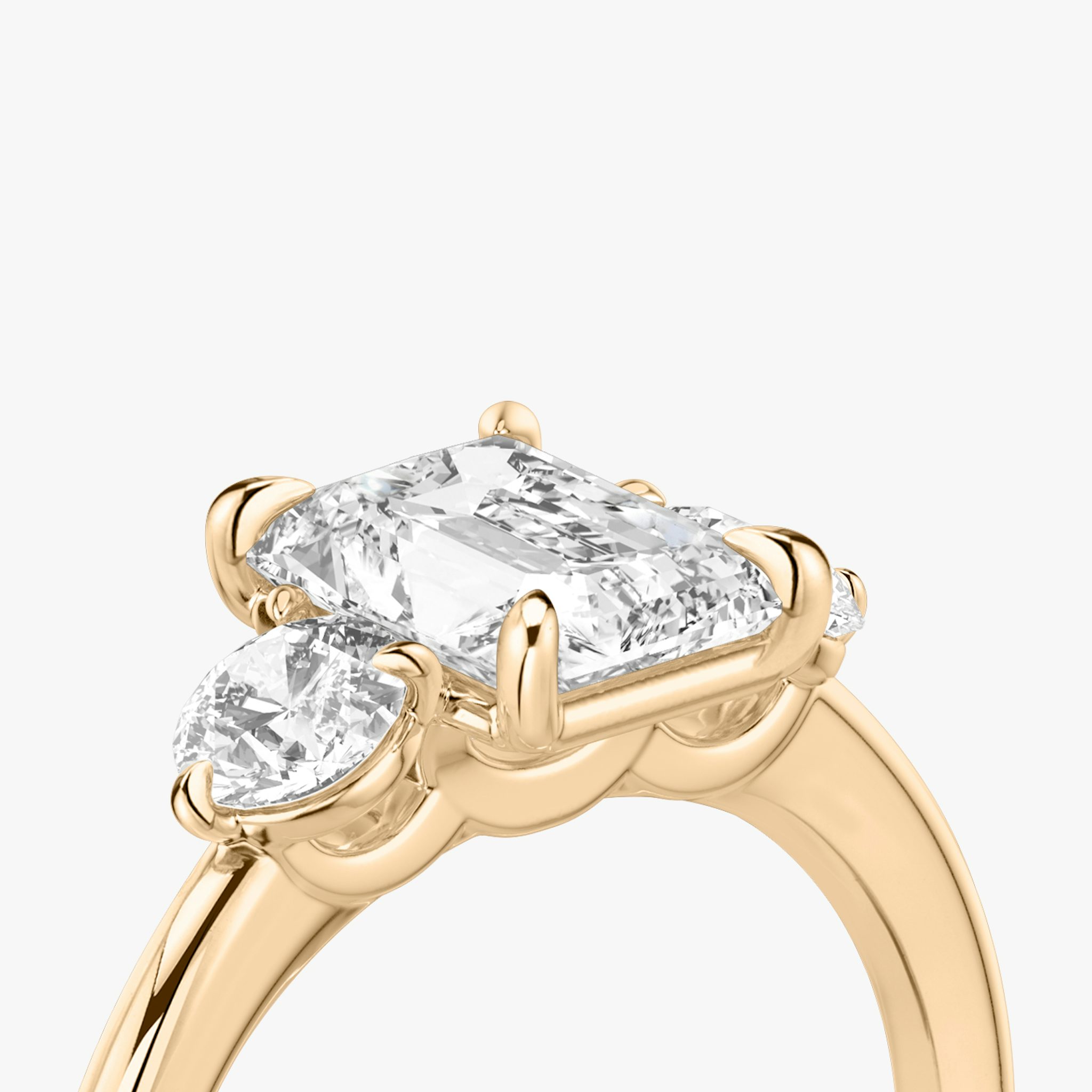The Three Stone | Radiant | 14k | Rose Gold | bandAccent: Plain | sideStoneCarat: 0.25ct | sideStoneShape: Round Brilliant | diamondOrientation: vertical | caratWeight: other