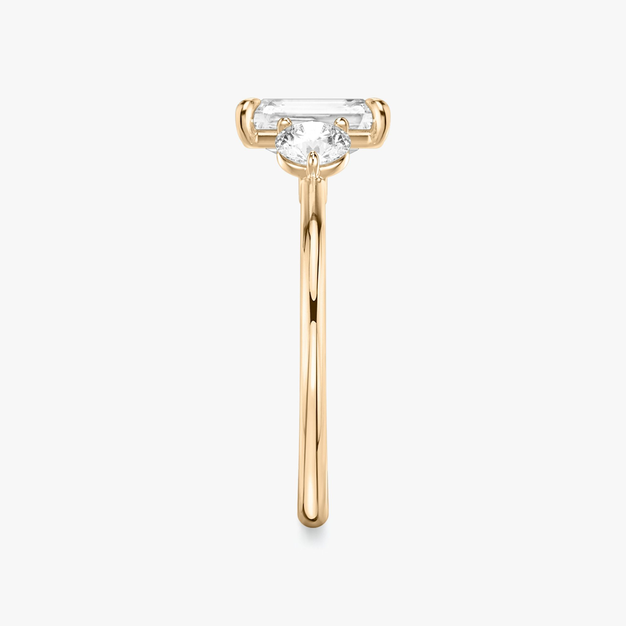 The Three Stone | Radiant | 14k | Rose Gold | bandAccent: Plain | sideStoneCarat: 0.25ct | sideStoneShape: Round Brilliant | diamondOrientation: vertical | caratWeight: other