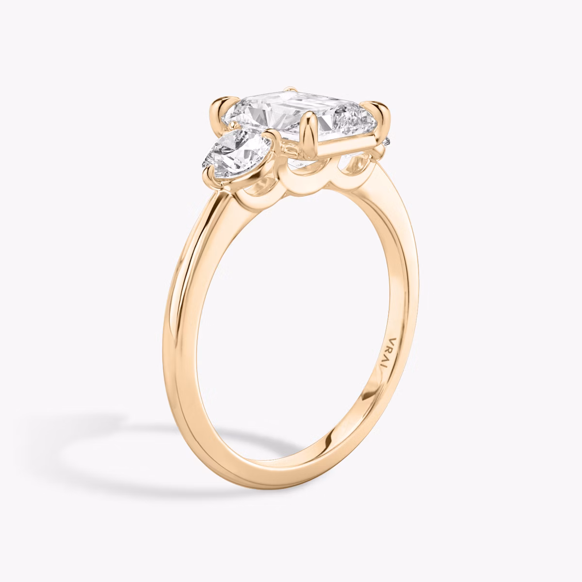 The Three Stone | Radiant | 14k | Rose Gold | bandAccent: Plain | sideStoneCarat: 0.25ct | sideStoneShape: Round Brilliant | diamondOrientation: vertical | caratWeight: other