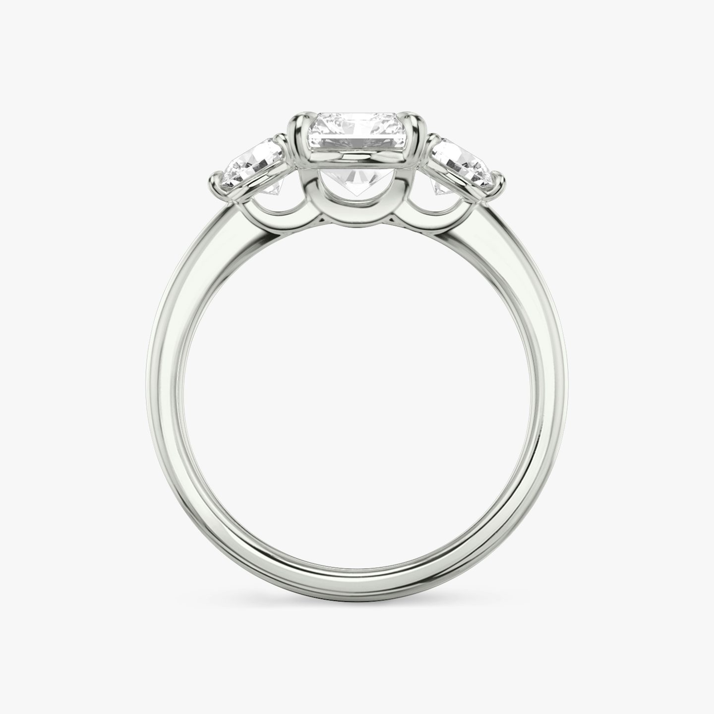 The Three Stone | Radiant | Platinum | bandAccent: Plain | sideStoneCarat: 0.25ct | sideStoneShape: Round Brilliant | diamondOrientation: vertical | caratWeight: other