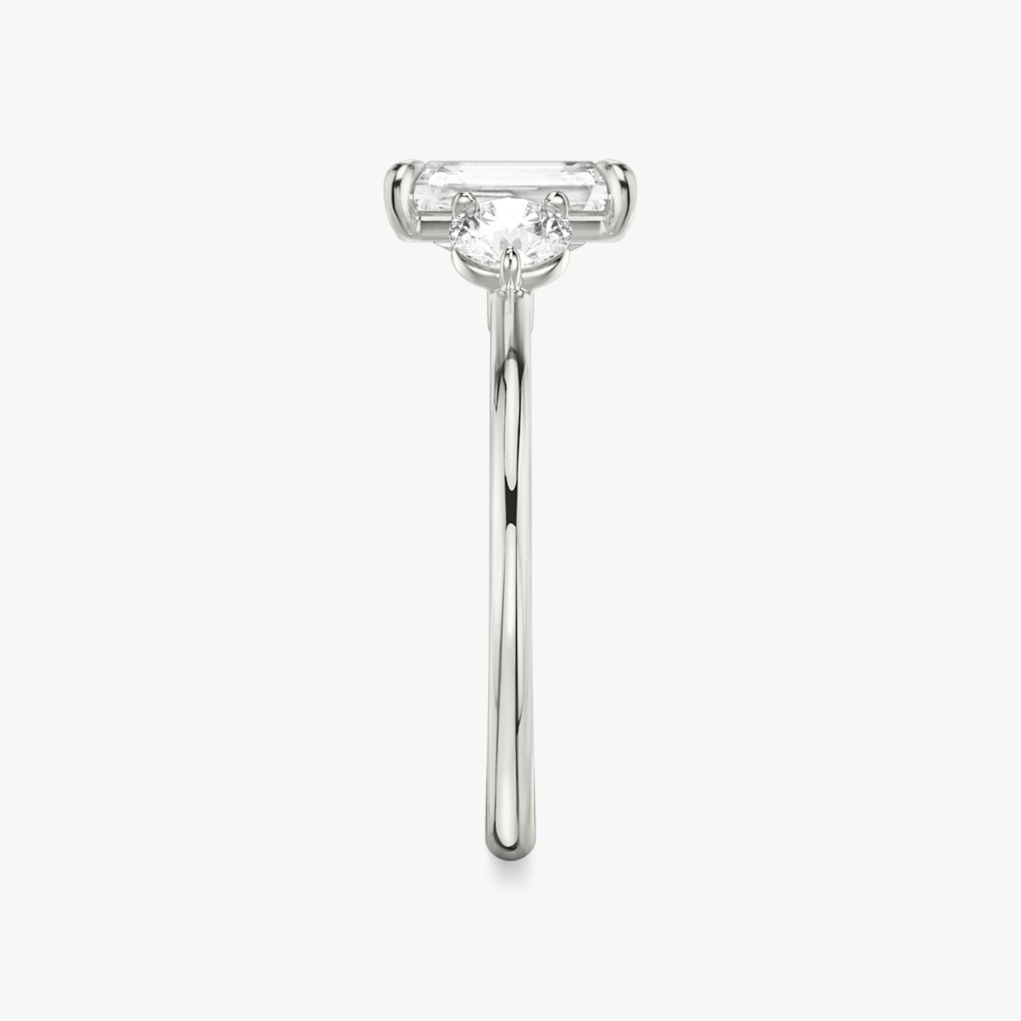 The Three Stone | Radiant | Platinum | bandAccent: Plain | sideStoneCarat: 0.25ct | sideStoneShape: Round Brilliant | diamondOrientation: vertical | caratWeight: other
