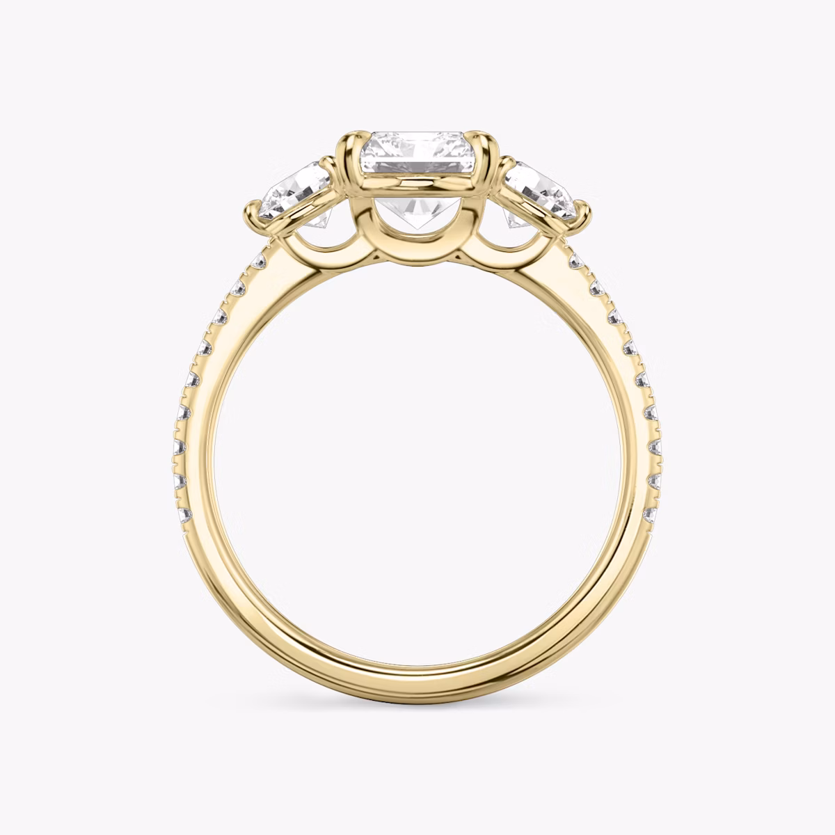 The Three Stone | Radiant | 18k | Yellow Gold | bandAccent: Pavé | sideStoneCarat: 0.25ct | sideStoneShape: Round Brilliant | diamondOrientation: vertical | caratWeight: other