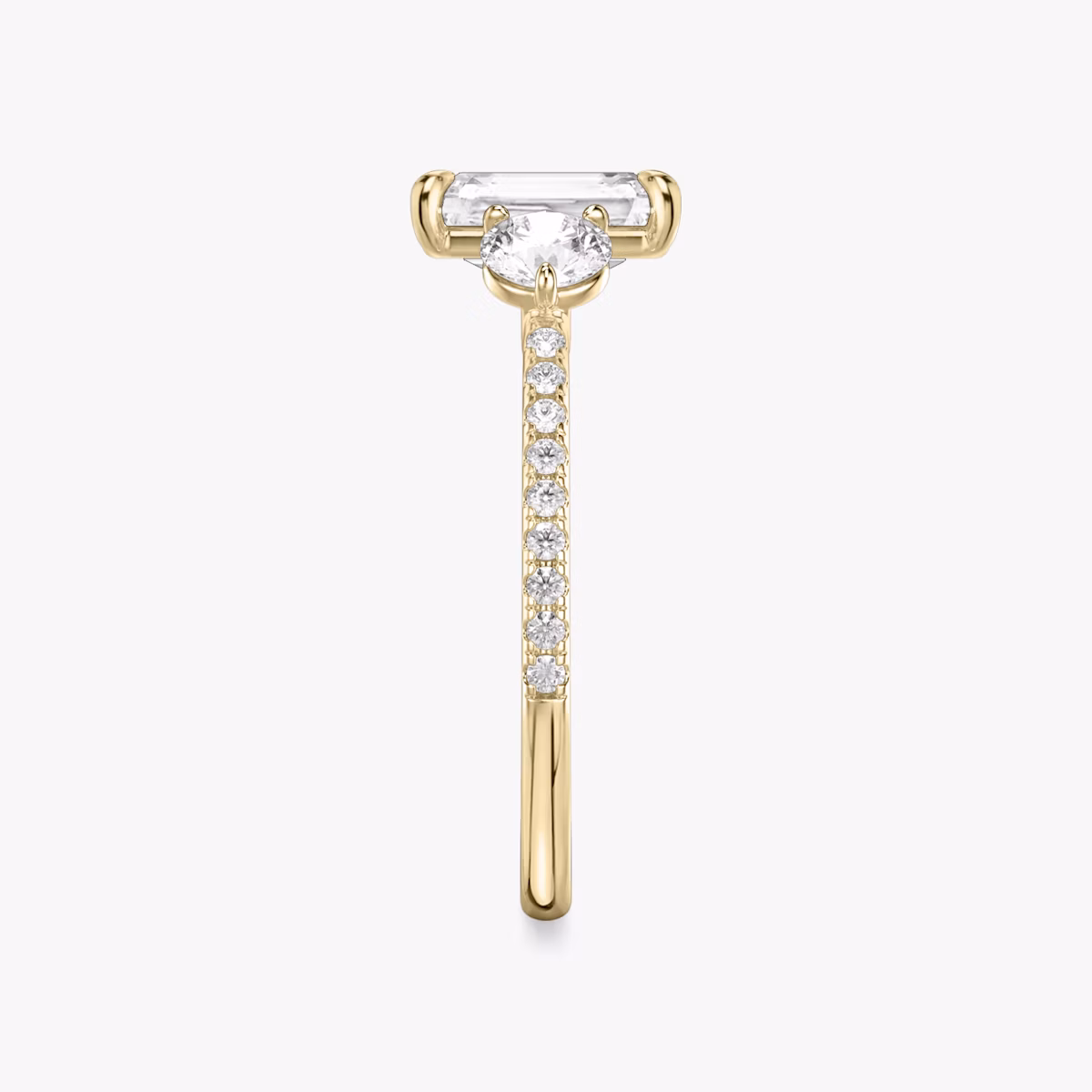 The Three Stone | Radiant | 18k | Yellow Gold | bandAccent: Pavé | sideStoneCarat: 0.25ct | sideStoneShape: Round Brilliant | diamondOrientation: vertical | caratWeight: other