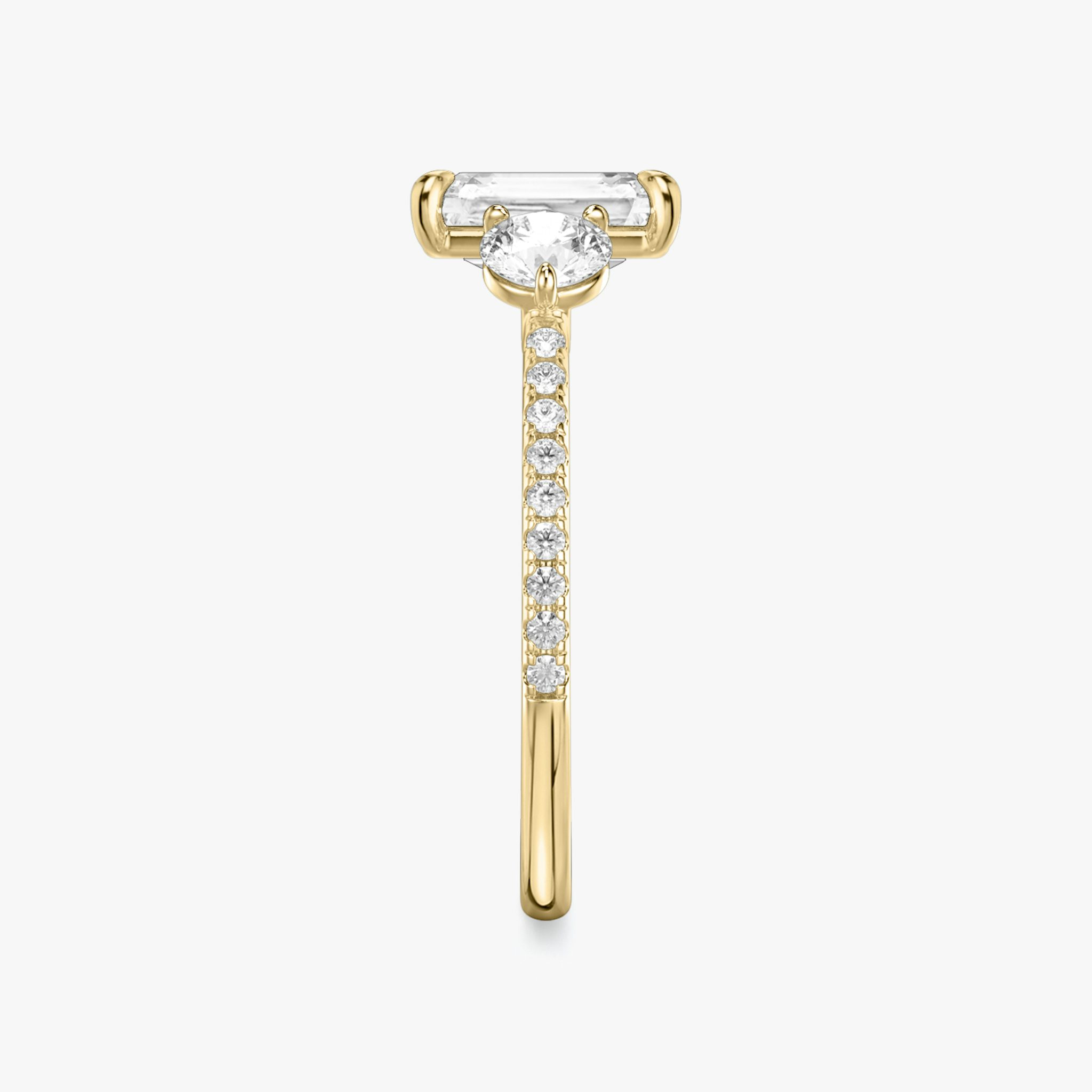 The Three Stone | Radiant | 18k | Yellow Gold | bandAccent: Pavé | sideStoneCarat: 0.25ct | sideStoneShape: Round Brilliant | diamondOrientation: vertical | caratWeight: other